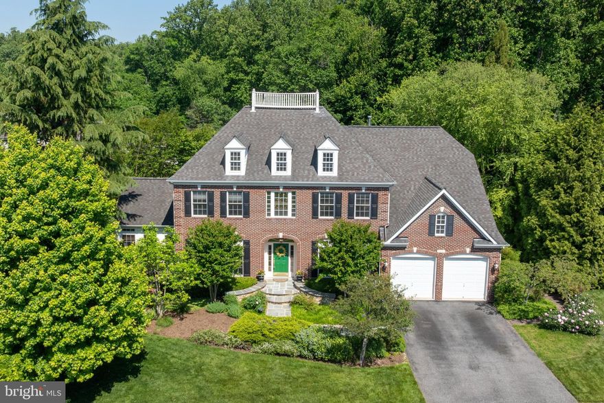 Outstanding opportunity to own in Jenifer Ridge, one of the most desirable communities in Baltimore County. This 5‑bedroom, 4.5‑bath brick colonial sits on a beautifully landscaped, flat lot backing to trees for exceptional privacy. The owners have meticulously maintained the home over the years. The open‑concept chef’s kitchen features cherry cabinetry with glass displays, Quartz Caesarstone counters, Marble Manor Calacatta glossy ceramic subway tile backsplash, a deep undermount double stainless steel sink, Sub‑Zero double‑door refrigerator, Wolf stainless steel range hood, Wolf double ovens, an upgraded stainless steel dishwasher with warranty, a hanging pot rack over the large center island, recessed lighting, a pantry, and a separate food prep counter and sink off an adjoining hall. The large kitchen table area flows to a family room with a floor‑to‑ceiling stone hearth with gas fireplace, tray ceiling, recessed lighting, and an integrated surround‑sound speaker system. A convenient half bath is located just off the family room. Adjacent to the large living room is a conservatory/sunroom—perfect for morning coffee or evening wine—featuring three walls of windows with transoms, custom window treatments, and its own HVAC unit for year‑round comfort. This generous space can serve as an office, playroom, game room, or true conservatory. A private main‑level office with built‑in shelving and desk provides an ideal work‑from‑home setup. The two‑story foyer leads to the second level, where you’ll find a spacious primary suite with a sitting room, tray ceiling, two walk‑in closets, and a private ensuite bath with jacuzzi and upgraded Grohe shower fixtures. Three additional bedrooms and two full baths complete the upper level—one hall bath and one ensuite in the fourth bedroom. The upstairs HVAC system (Unit 3) was upgraded in December 2023 to a premium energy‑efficient Carrier Comfort system. The impressive lower level, with above‑ground windows and French‑door walkout to the patio, includes a large recreation room, a spacious fifth bedroom with full bath, new wall-to-wall carpeting in 2020, washer and dryer, additional refrigerator and freezer, a bonus room, and two sizable storage rooms. A 75-gallon energy efficient, natural gas water heater was upgraded in 2021. A radon mitigation system is included. The oversized deck off the kitchen functions as an additional outdoor living room, complete with a seasonal waterproof awning ideal for summer entertaining. The backyard is truly spectacular—private, flat, and serene—with a hardscaped stone outdoor kitchen, patio with pergola, fountain, garden arbor, professionally landscaped grounds with irrigation and lighting, and a separate stone firepit patio. Perfect for gatherings, yard games, and gardening. Tree house conveys AS IS. This home offers exceptional features, flexible spaces, and a rare level of privacy. Don’t miss this opportunity to live in rarely-available Jenifer Ridge.