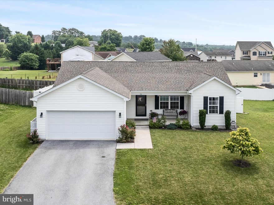 Come check out this charming single-family rancher located in the desirable Butlers Bridge community, less than half a mile from a local fresh farm market. This well-maintained home features beautiful true hardwood floors throughout the main living area and offers a functional layout with a convenient split-bedroom floor plan. The front windows provide lovely views of the nearby mountain ridge, bringing a sense of peace and natural beauty into the home.

The spacious kitchen is ideal for both everyday living and entertaining, equipped with a center island with space for barstools, granite countertops, and rich dark wood cabinetry. Cathedral ceilings enhance the open, airy feel of the main living area, adding to the overall sense of space.

The primary suite includes two windows for ample natural light, a walk-in closet, and an ensuite bathroom with a tiled standing shower, a corner soaking tub, and a dual vanity. Two more generously sized bedrooms share a full guest bath.

Additional features include a two-car garage with built-in storage options, a laundry room with tile flooring conveniently located just off the garage entry, and a generously sized closet that could easily serve as a pantry.

Enjoy privacy in the fully fenced backyard with low-maintenance white vinyl fencing. Additional upgrades include recessed lighting, ceiling fans, plantation blinds, and one-touch blinds—all of which convey with the home.

Conveniently located near schools, hospitals, shopping, and major interstates. Come enjoy the ease of single-level living and see if this move-in ready home is the perfect fit for you.