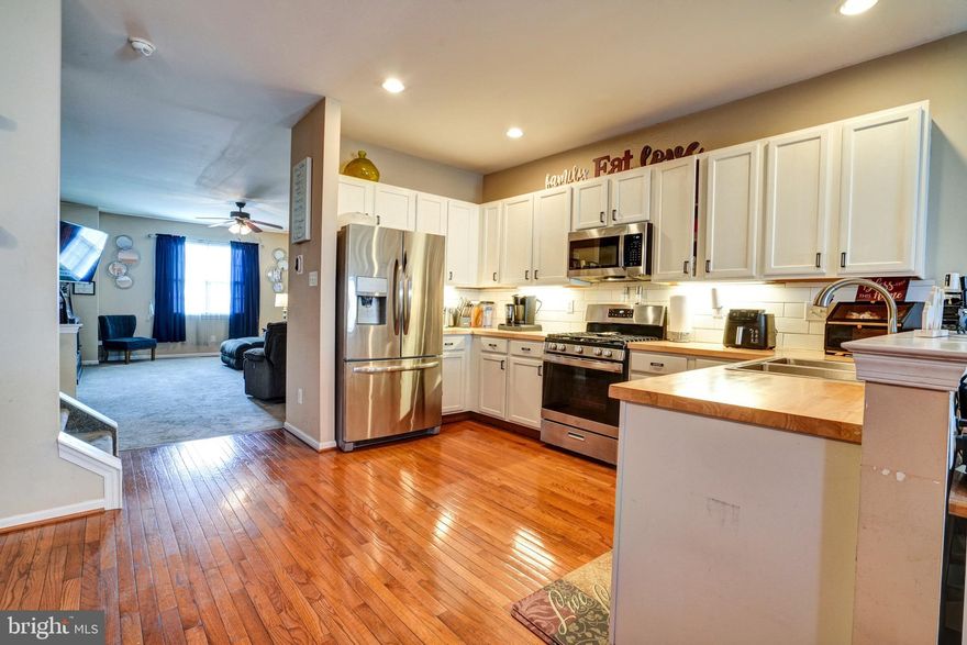 Feel the love at 1623 Brynne Lane in Upper Pottsgrove, PA—now offered for sale! Welcome to your next home, where comfort and care are evident from the moment you arrive. Step inside through the grand two-story foyer and take your time exploring this beautifully maintained three-bedroom, two-and-a-half-bathroom townhouse with an open and inviting floor plan, perfectly situated in the desirable Woodbrook community. Join us for an Open House this Sunday from 12 PM to 2 PM.  This thoughtfully upgraded home is designed for both everyday living and effortless entertaining. The custom eat-in kitchen, complete with all appliances included, features hardwood flooring and provides direct access to a spacious Trex deck—ideal for relaxing or hosting guests. A versatile celebration and entertaining room with a custom bar offers the perfect space for gatherings and can also serve as a formal dining room. The cozy yet grand living room invites you to unwind, while the convenience of second-floor laundry adds to the home’s functionality. Upstairs, you’ll find three generously sized bedrooms, including a serene primary suite featuring a newer custom bathroom and a walk-in closet, along with so much more to love.  One of the most delightful surprises in this home is the grand family room, fully equipped with media and a movie screen—perfect for unforgettable movie nights. This inviting space is truly a favorite, offering the ideal setting for loved ones to gather, unwind, and enjoy unlimited bowls of  popcorn while watching the latest Hollywood premieres together, bring on the Oscars!  This special home is nestled within a quiet residential setting in Upper Pottsgrove Township, offering the perfect balance of suburban tranquility and everyday convenience. Located within the highly regarded Pottsgrove School District—home to Pottsgrove Senior High School, Pottsgrove Middle School, and Lower Pottsgrove Elementary School—all are just a short drive away.  Outdoor enthusiasts will appreciate the nearby parks and access to scenic areas like Manatawny Creek, where walking, biking, and enjoying nature can be part of your daily routine. The location also places you just minutes from major commuting routes, shopping, dining, and entertainment. Nearby destinations such as Upland Square Shopping Center offer a variety of retailers, grocery stores, and entertainment options, while Giant Food Stores, Target, Philadelphia Premium Outlet Center and other local shopping centers make everyday errands simple and convenient. The surrounding area features a wide array of dining options, from charming cafés and family-owned restaurants to popular takeout spots.  Ideally situated near Routes 422, 100, and 663, this home offers easy access to major employment centers including King of Prussia, Philadelphia, and Reading—making commuting a breeze while still enjoying the peace of suburban living.  HOA fees are affordable at $300 a year.   Come experience the warmth, care, and lifestyle that make 1623 Brynne Lane truly feel like home.