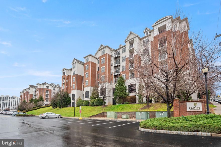 Looking for a perfect rental that blends the best of suburban and city amenities?  … you'll love the Grande at Riverview!  This stunning high-rise condo community is centrally located and nestled just steps away from walkable downtown Conshohocken Boro and the Septa regional rail line running directly into Philadelphia. Whether you prefer local restaurants & shopping in the suburbs ... or you crave all that Center City has to offer ... the Grande at Riverview offers easy access to both worlds! Step inside this spacious 2 bedroom, 2 full bath first floor condo where you'll find beautiful appointments throughout.  Gorgeous gourmet kitchen boasts 42" cherry cabinetry, stainless steel appliances, custom tile backsplash and granite countertops.  Adjacent dining room accommodates seating for 4-6 guests and boasts stylish gray striped walls accented with a stunning contemporary chandelier.  In the heart of this home, you'll LOVE the SPACIOUS and bright oversized living room complete with crown molding, recessed lighting and four huge windows that overlook a quiet outdoor courtyard of trees, walkways, benches and green open space.  Primary bedroom features a HUGE walk-in closet with custom closet system, rear exit to private patio overlooking the community open space and a stunning primary bath complete with cherry vanity, granite countertop, brushed nickel plumbing fixtures, soaking tub and oversized shower with frameless shower door.  Second bedroom also features a custom closet system and rear exit to private patio.  A second full bath services bedroom two and the main living area. Full sized washer & dryer and a quaint desk nook complete this home's offerings.  Love to exercise? You'll love the on-site fitness room!  Love to swim? The community pool is the perfect spot to relax on a warm summer day.  Looking for an outdoor area to enjoy food and friends... you'll love the outdoor barbeque areas located throughout the community.  Best of all ... this rental comes with a secure INDOOR parking spot in the community garage in addition to the outdoor parking lot. Landlord pays the monthly HOA fee which includes cold water, sewer, trash removal, snow removal and common area maintenance. Tenant covers electric, gas, heat, A/C, hot water & internet/phone/cable services. Minutes to Rts 76, 476, and the PA Tpke.  NO PETS/NO SMOKING. First month rent + 2 month's security deposit required to move in. $40 application fee required for each adult over 18 years old.