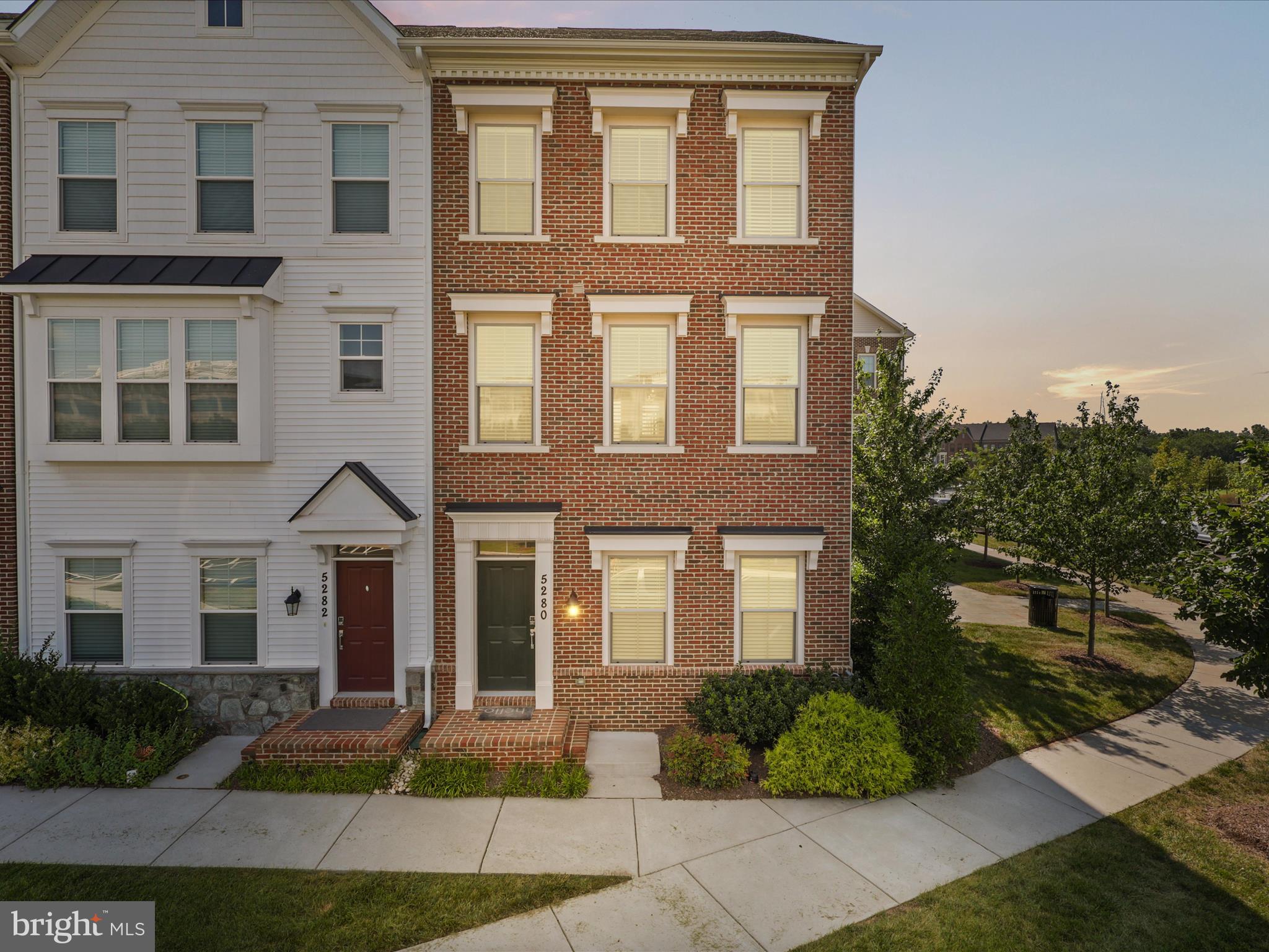 Exceptional 3 year old townhome where modern living is at its finest with a perfect blend of style, space, comfort and low maintenance - This stunning 4 level end unit townhome with two sided brick with an open concept layout flows seamlessly throughout the house with natural light flowing from all three sides - This elegant home comes with 4 bedrooms, 3 full bathrooms, 2 half bathrooms, 2 car attached rear entry garage - Window coverings thru out the house - The walk in level includes a recreation room with hardwood flooring, recessed lighting, windows, a half bathroom, with a access to your garage which has two side windows - Oak staircase lead you to the main level which has an open floor plan with a concept to design the way you want it - Hardwood flooring thru out this level and recessed lighting - The gourmet kitchen is a dream featuring expansive island with quartz countertops, bosch stainless steel appliances, upgraded cabinetry, pantry and a half bathroom - The bright and open family / great room flows seamlessly on this entire level with a trex balcony on the back side - The upper level offers three bedrooms, two full bathrooms with hardwood flooring thru out the floor - Master bathroom has upgraded ceramic tiles, standing shower and two separate vanities - Washer and Dryer are on this level for your added convenience - The fourth level loft offers a complete one bedroom with a closet and a full bathroom - Lots of visitor parking - Plus, enjoy the easy access to Route 50, Route 28, Route 66, Dulles International Airport - Nearby shopping destinations provide an array of dining, retail and entertainment choices - Townhome with this kind of blended features and location is a rare to find !!!!!