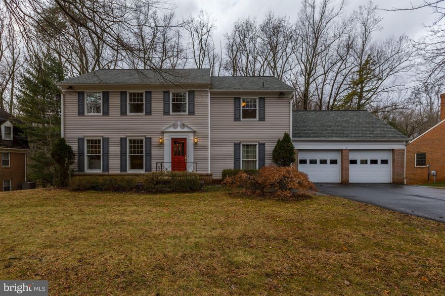 OVER 5,000 SQ FT! Builder's own home! Large three story addition includes large kitchen with family room and new master owner's suite.  Lower level is huge with sound proof room. Two family rooms, den/office with two workspaces, separate dining room and living room.  Tons of built-ins and newer windows and systems including roof.  Backs to parkland.