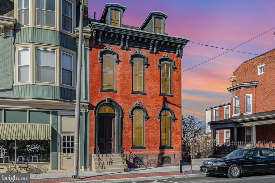Welcome to this stunning downtown gem—fully remodeled from top to bottom while preserving its timeless charm.
As you step into the foyer and kick off your shoes, you’ll be greeted by the original French doors and transom, leading to a beautifully preserved stairwell. The entryway features elegant terrazzo flooring and a custom Venetian chandelier, setting the tone for the home’s character.
Off the stairwell, you’ll find a cozy living room filled with natural light, showcasing hardwood flooring and a cast iron gas fireplace—perfect for relaxing evenings.
Continue to the kitchen, where you’ll discover ample countertop space, plenty of cabinetry, and a central island ideal for enjoying breakfast, lunch, or dinner.
Upstairs on the second floor, you’ll find three spacious bedrooms and a stylish guest bathroom, all with original hardwood flooring. The highlight is the remodeled primary suite, featuring a private, marble-clad bathroom and a walk-in closet.
The charm continues as you ascend to the third floor, where the fourth bedroom awaits. This inviting space boasts exposed beams and beautiful wood trim, adding warmth and character.
Step outside to your own private urban oasis—a serene garden retreat complete with a koi pond, offering a peaceful escape in the heart of the city.
This inner-city charmer won’t last long—schedule your showing today!