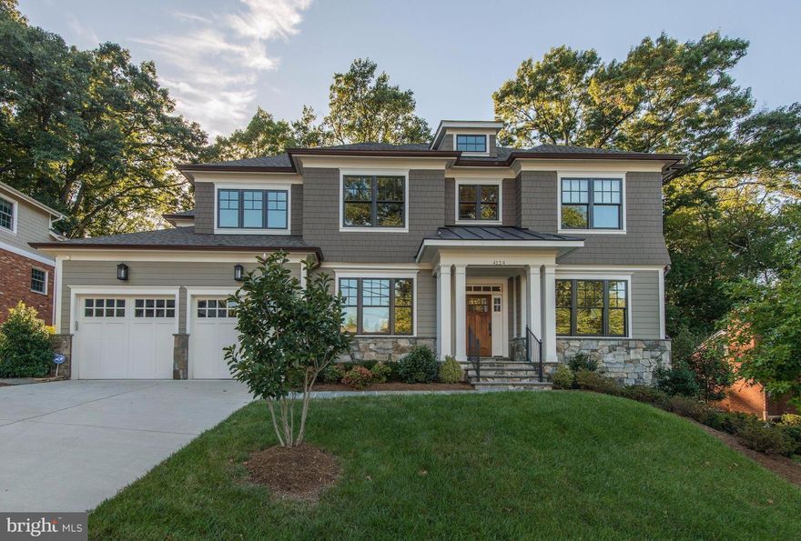 N. ARLINGTON CUSTOM SHOWPIECE - JUST 1 STOP LIGHT TO DC! Stunning LIKE-NEW custom home w/ an open floor plan, decadent millwork + top-of-the-line finishes. Gorgeous gourmet kitchen w/ breakfast area opens to FR adorned w/ a beautiful coffered ceiling. Private backyard w/ flagstone patio + outdoor fireplace that backs to quiet parkland. Finished walkout Lower Level w/ wet bar. 2-car garage.