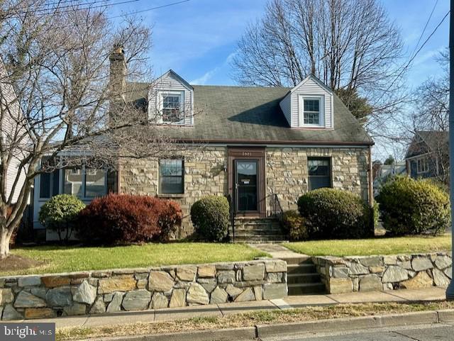 Absolutely charming, stone, Cape Cod with a private backyard and detached garage, all within walking distance to East Falls Church Metro! Enjoy a warm fire when the snow falls  with beautifult gas logs in the spacious living room featuring hardwood flooring and custom built-ins. In the summer, enjoy the extra living area on the spacious, screened in porch that walks out to the gorgeous gardens and open, back yard. The entire upper level is the primary suite with a full bath, hardwood flooring and so much storage in  the closets and eves. There are two additional bedrooms on the main level with a "Jack and Jill" , full bath. The beautiful kitchen boasts lots of storage with 42 inch, solid oak  cabinets, granite counter tops and beautiful field stone flooring. The main levels features hardwood flooring throughout. The lower level is partially finished and makes a great family room for movie night and space for an in-home office with brand new carpeting. The one car, detached garage is a rare find in Arlington. You can leave the car and walk to East Falls Church Metro! This home has been meticulously maintained, updated kitchen, professionally painted and is move-in condition.