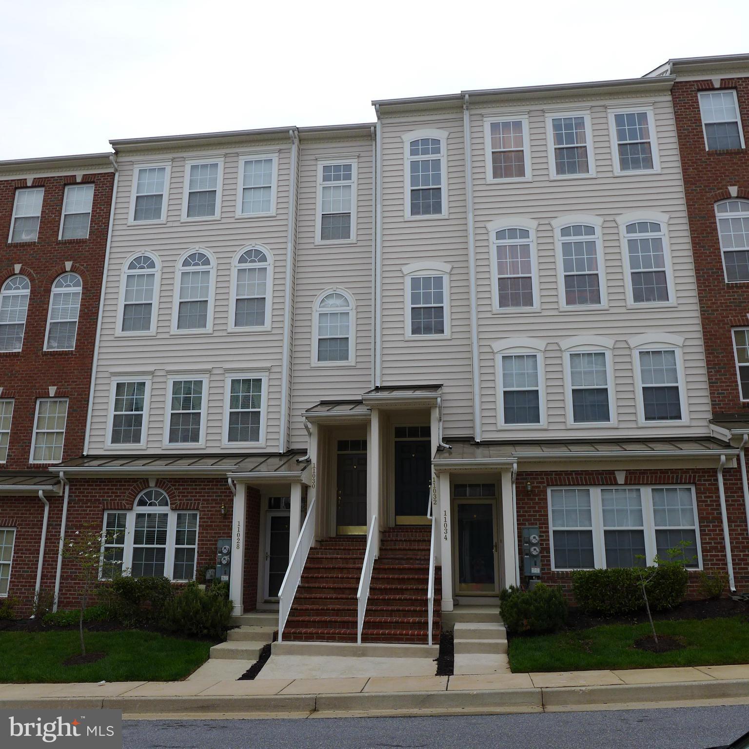 FABULOUS 2-LEVEL GARAGE CONDO W/ ALMOST 2300 SQ. FT. OF LIVING SPACE. OVERSIZED LIVING & DINING ROOM DRENCHED IN LIGHT, PERFECT FOR ENTERTAINING. KITCHEN W/ FAMILY ROOM SPACE & 3-SIDED FIREPLACE. HUGE MASTER SUITE W/ A GENEROUS WALK-IN CLOSET & PRIVATE BATH W/JETTED TUB & SEPARATE SHOWER. SPACIOUS 2ND & 3RD BEDROOMS. CLOSE TO SHOPPING, RESTAURANTS, WALKING/BIKING TRAILS, COMMUTER ROUTES & METRO.