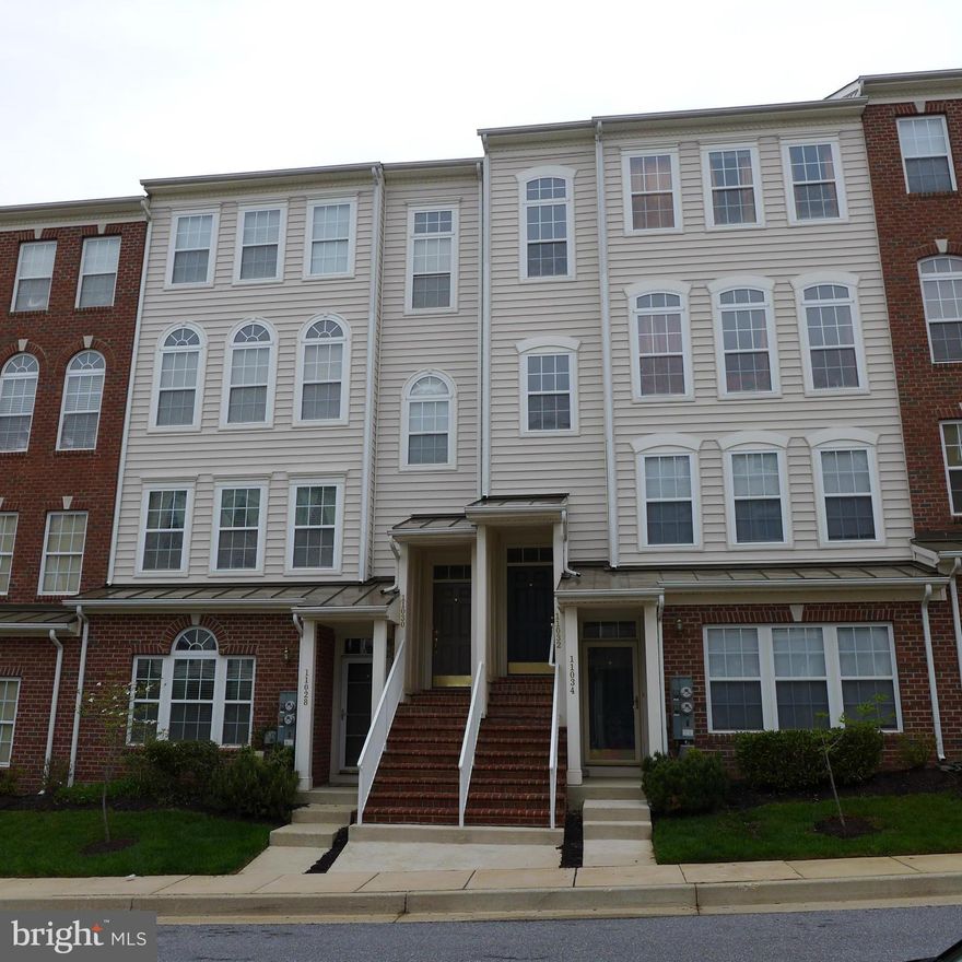 FABULOUS 2-LEVEL GARAGE CONDO W/ ALMOST 2300 SQ. FT. OF LIVING SPACE. OVERSIZED LIVING & DINING ROOM DRENCHED IN LIGHT, PERFECT FOR ENTERTAINING. KITCHEN W/ FAMILY ROOM SPACE & 3-SIDED FIREPLACE. HUGE MASTER SUITE W/ A GENEROUS WALK-IN CLOSET & PRIVATE BATH W/JETTED TUB & SEPARATE SHOWER. SPACIOUS 2ND & 3RD BEDROOMS. CLOSE TO SHOPPING, RESTAURANTS, WALKING/BIKING TRAILS, COMMUTER ROUTES & METRO.