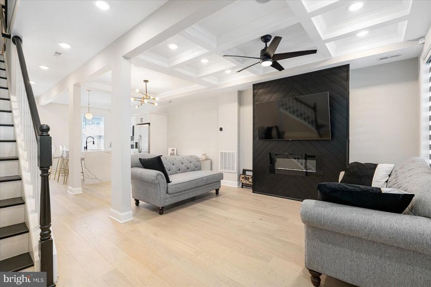 APPROVED SHORT SALE - Literally THE BEST DEAL ON THE MARKET! No, this is NOT a model home; however, it sure does show like one!!! Sometimes, opportunity does more than just knock! NEW PRICE! Welcome to Greenspring Estates - A Turnkey Gem in the Heart of Baltimore! Truly a "smart home", this one is so smart that the BGE bill hovers around those of tiny one bedrooms. Seriously! From the smart HVAC, to the insulation, to the high efficiency lighting, mechaincals, etc., this meticulously cared-for townhome blends modern luxury, smart design, and thoughtful upgrades you won’t find in nearby listings. Why? Because this isn’t a quick flip—it’s a nearly new construction from the ground up, with everything redone down to the pipes. The difference? You’ll feel it the second you walk in. Step inside to an open-concept floor plan full of natural light, anchored by a dramatic coffered ceiling, oversized industrial fan, and a stunning LED fireplace feature wall. And just when you think it can’t get better - BOOM - you’re in the designer kitchen: waterfall quartz countertops, stainless steel appliances, tray ceilings, sleek backsplash, touch faucet, USB charging ports, and room to entertain, cook, and live. Walk out to your private deck overlooking your off-street two car parking pad - no rear yard to mow, just peace of mind and a place to sip your morning coffee. Upstairs, the primary suite stuns with a massive walk-in closet and spa-like bath. Two more spacious bedrooms and a full bath complete the level. Head downstairs and unlock serious bonus space: a finished basement with a bedroom, office/flex space, wet bar, and second living area - perfect for guests, a gym, podcast space, YouTube cave, or your favorite late-night hang. Other highlights include: 2 LED fireplaces, state-of-the-art security system with cameras, tight-knit, rehabbed block with community group chat, a possible FHA loan assumption potential for qualified buyers (a rare perk in today’s market) and so much more! Most importantly: this isn’t just a house - it’s a home with intention, owned and loved by someone who's been here from drywall to doorbell! A must see? Sure... but really... a MUST EXPERIENCE! Bank is ready to make a deal! Let's do this!!! Previous buyer financing fell through.