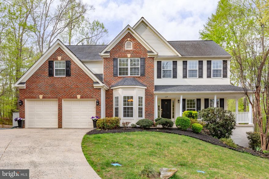 Austin Ridge Beauty! Cul-de-sac, Private In-Ground Pool, 5BR, 5BA, 5,000+ sq ft—Updated Kitchen & Primary Bath, Fresh Paint, Refinished Wood Floors, New Carpet, New LVP Flooring, Finished Basement, Media/Theatre Room, Private Guest Suite and SO MUCH MORE!  This home is beautifully positioned on a cul-de-sac and backing to a peaceful tree line, offering both privacy and space in the highly desirable Austin Ridge community.  This impressive home features over 5,000 square feet, offering 5 bedrooms and 5 bathrooms with a thoughtfully designed floor plan.  The brick front exterior and welcoming covered front porch create timeless curb appeal, while the home’s position, set back from the street, adds to its sense of privacy.   The generous layout provides spacious living areas, along with well-sized bedrooms.  The updated kitchen features stunning granite countertops, custom tile backsplash, abundant cabinetry, double oven, a walk-in pantry, and a stylish coffee bar area—perfect for everyday living and entertaining.  The two-story family room flows seamlessly into the kitchen and overlooks the backyard. The main level also includes a versatile office or bedroom, a full bathroom, a dedicated dining area, and an inviting sitting area. Upstairs, the spacious primary suite features a cathedral ceiling, an updated private bathroom with stunning tile, and an oversized walk-in closet. This -level also offers three additional bedrooms and two full bathrooms, including one bedroom with its own private en-suite bath.  The finished lower level showcases a family room, rec area, gym and dedicated media/theatre room—perfect for movie nights, game days, or creating your own private theater experience.  Step outside to your own private retreat featuring a beautiful In-Ground Pool, ideal for summer entertaining, relaxing weekends, and creating lasting memories.  Overlook the backyard on the large Trex deck that features stairs to the backyard!   Located in the Austin Ridge community, residents enjoy convenient access to shopping, dining, commuter routes, and more.  This home offers the perfect combination of space, privacy, and outdoor living—a rare opportunity in one of Stafford’s most sought-after neighborhoods.