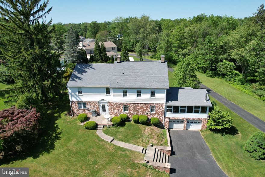 This magnificent 3,500 + Square Foot Farmhouse seamlessly blends captivating history with colonial design for a truly unparalleled living experience. Located in the sought-after Palomino Farms, this Original Farmhouse has served as both a hotel and a private academy in its illustrious past. The custom design boasts deep windowsills and stunning exposed wood flooring throughout many of the home's spacious rooms, accentuated by hand-hewn wood beams in some areas. This home features a truly Gorgeous Dining Room and Living Room boasting multiple fireplaces perfect for entertaining guests. The large, enclosed sunroom with wood stove offers Beautiful Tranquil views of the surrounding private, wooded and creek side scenery. Open foyer and Large eat-in kitchen! Cozy Den off of the kitchen along with half bath and sliders to the patio.  Conveniently located near the Turnpike, parks, shopping, and local restaurants, this stunning 3,512 square foot masterpiece on a 1.855 Acre property, offers a two-car attached garage and long private drive with ample parking. Come see what makes this Beautiful Home & Property the perfect fit for your lifestyle!!