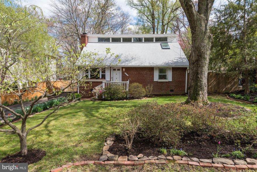 STRAIGHT OUT OF A FAIRYTALE!  Fabulous cape, lovingly maintained.  Charming gas fireplace LR, new granite countertops, paver patio  lrg private, flat yard w/ mature garden just a min from Arlington,  owners suite is the whole 2nd floor, dramatic vaulted ceilings with skylights and clerestory window, new carpet, amazing closet space, new windows &skylights, 2 room shed w/ electrical.  OPEN SUN 12-2