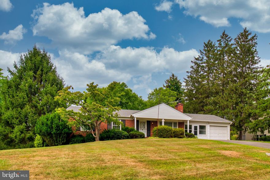 Welcome Home to this Bright Rancher with 3 bedrooms and 2 baths  It is Beautifully situated on a Magnificent almost a Half Acre Corner lot.  In the Spring, the blossoms will bloom on the Pear trees and Azaleas!   Featuring Gorgeous original Hardwood Floors, Fireplace; Beautifully re-done lower level Family Room and a potential half bath; Eat in Kitchen and Separate Dining Room, Roof 10 years young, Gutters just replaced in 2020, and for those family and friends get-togethers there are plenty of places for your guests to park in the Attached Garage or on the Spacious Driveway.  This house is waiting for you to move in and make it their Own! Tour Today!