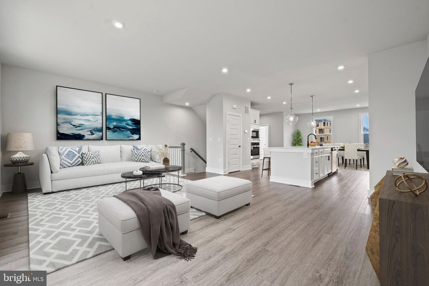 Welcome to the charming Delilah end unit townhome, nestled in the highly sought-after community of Overlook at Westmore. This stunning home boasts a spacious lower level flex space with a full bath, perfect for hosting guests or creating your dream home office.

Step onto the main level and be greeted by an inviting dining area, ideal for intimate gatherings and special occasions. The gourmet kitchen is any home cook's dream, featuring top-of-the-line appliances and ample counter space to whip up delicious meals. The adjacent family room is perfect for cozy nights in or entertaining friends.

But that's not all – step out onto your private deck and take in the beautiful views of the surrounding greenery. It's the perfect spot to relax with a cup of coffee or enjoy an al fresco dinner on warm summer evenings.

As you make your way upstairs, you'll find a luxurious primary suite complete with its own ensuite bathroom – providing you with ultimate comfort and privacy. Two additional bedrooms are also located on this level along with a well-appointed hall bath.

*This home is under construction. Please visit the onsite Sales Trailer for information. Photos are of a similar home.