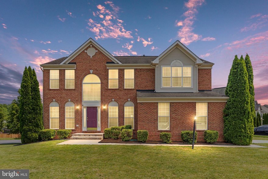 Welcome to the exquisite colonial home nestled in the highly sought-after neighborhood of The Gallery. Meticulously maintained, this residence boasts four bedrooms and three and a half bathrooms, providing ample space for comfortable living. As you step through the front door, you're greeted by a warm and inviting 2-story foyer, flanked by a formal living room and dining room, creating an ideal setting for hosting memorable holiday gatherings. Continuing down the foyer hallway, you'll discover the expansive family room, adorned with a charming stone gas fireplace. This cozy retreat is perfect for curling up with a captivating book during the winter months. The gourmet kitchen is a culinary enthusiast's dream, offering upgraded stainless-steel appliances, a built-in wall oven and microwave, a center island, granite countertops, beautiful cabinetry, and a convenient kitchen desk area. With its generous size, it provides ample room for entertaining family and friends. The main floor also features a private office for those seeking a quiet workspace, a convenient half bathroom, and a well-appointed laundry room for added convenience. As you ascend to the upper level, you'll encounter the spacious primary bedroom suite, complete with a sitting room, a sizable walk-in closet, and a luxurious full bathroom featuring a soaking tub, separate shower, and dual vanity. Three additional bedrooms and another full bathroom complete the upper level, offering comfort and privacy for everyone in the household. The lower level of the home presents a finished walk-out basement with versatile recreational space, prewired and decorated for a home theatre experience. Two additional finished rooms and a full bathroom provide endless possibilities for customization and accommodating guests.  A host of additional features elevate the appeal of this remarkable home, including ceiling fans, crown and chair molding, chandeliers, pendant lighting, and a newly installed HVAC and water softener. Don't miss the opportunity to make this exceptional home yours. Schedule your appointment today and experience the epitome of comfortable and luxurious living.