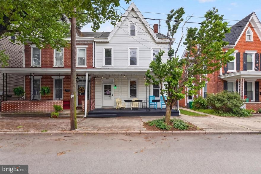 Located in the heart of Carlisle, this spacious and well-maintained home offers exceptional versatility and convenience. Enjoy easy access to downtown Carlisle’s shops, restaurants, markets, and seasonal events, along with close proximity to Dickinson College, Dickinson School of Law, and the U.S. Army War College.

Inside, the home features generously sized rooms with hardwood flooring across two levels, creating a warm and functional living environment. The updated eat-in kitchen, combined with new dual-zone central air conditioning and heating, offers both comfort and efficiency. Natural light fills the home through large windows, enhancing the inviting atmosphere throughout.

The main level includes a formal foyer, spacious living room, and a dining room with built-in features. Dual staircases—front and rear—lead to the upper level, where you’ll find three sizable bedrooms. One bedroom includes a private rear balcony overlooking the fenced backyard, while the other offers a flexible bonus room ideal for a home office, study, reading room, or additional living space.

The home includes one full bathroom and one-half bath, both thoughtfully updated. Additional highlights include a large walk-up attic providing excellent storage or potential for future use.

Outdoor spaces are equally appealing, with a welcoming front porch and a fully fenced backyard—perfect for relaxing or entertaining. A one-car garage and additional parking at the rear of the home provide valuable off-street parking and added convenience.

With its flexible layout and prime location, this property presents a strong opportunity for a variety of uses, including a primary residence, shared living arrangement, or investment property.

Schedule your showing today and explore the potential this Carlisle home has to offer.