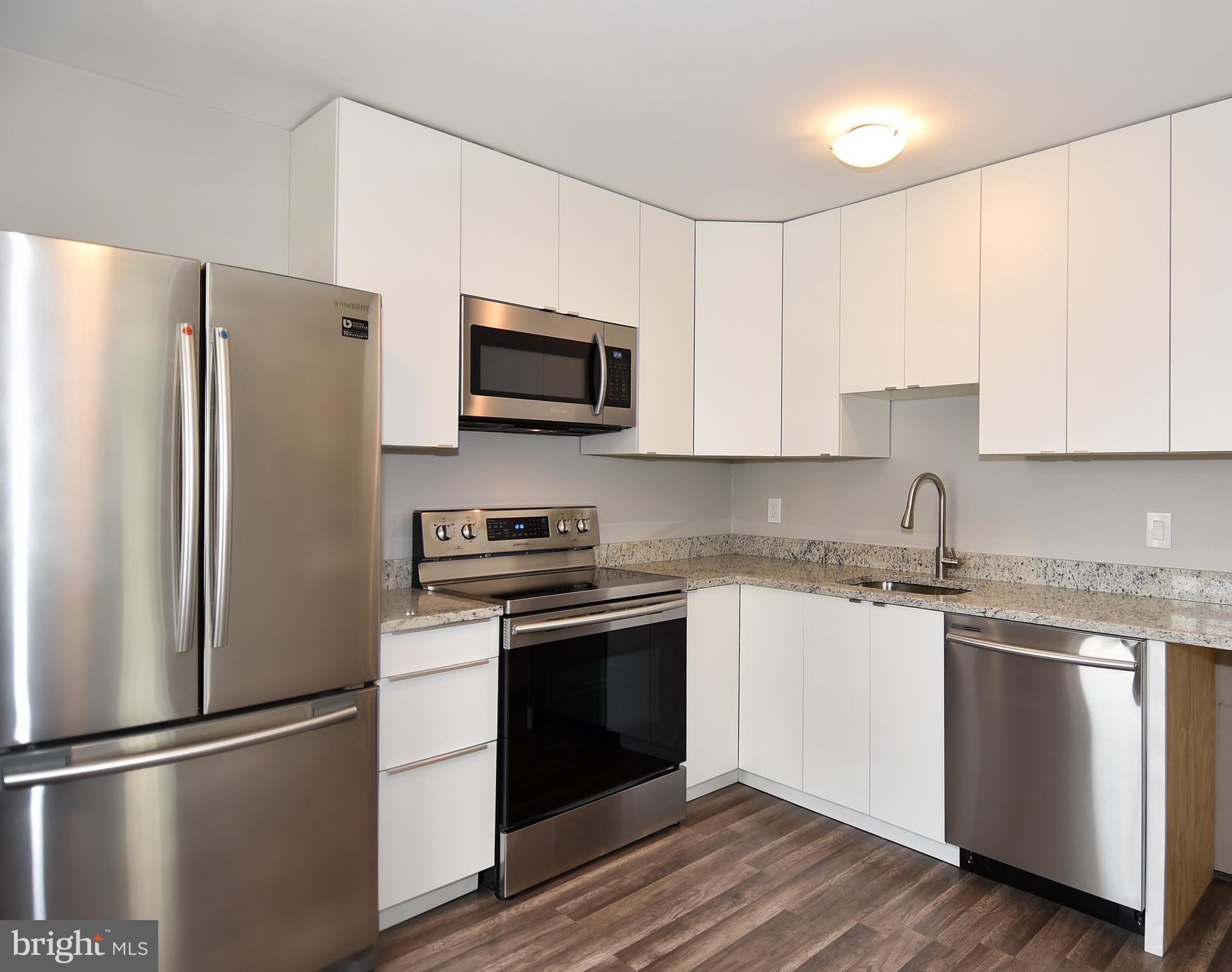 This bright and sunny unit is beautifully updated, and has a walk score of 98 out of 100! Wonderfully renovated kitchen with stainless steel appliances, wall-to-wall closets in bedroom, and a large walk-in closet. Secure building entry with intercom access, in-unit washer/dryer, and ALL utilities are only an additional $200 per month (tandem parking, wireless hi-speed internet and streaming, electric, water, sewer, gas, common area maintenance). Two assigned parking spaces are located near the entrance. A walker's paradise, within steps to the Red-Line Metro, grocery stores like Giant, Safeway, Trader Joes, Harris Teeter, and Target, plus 200+ restaurants and retail shops. Less than one mile from NIH and Bethesda Naval Hospital. Convenient access to DC, and you can even ride your bike on the Capital Crescent Trail to Georgetown!