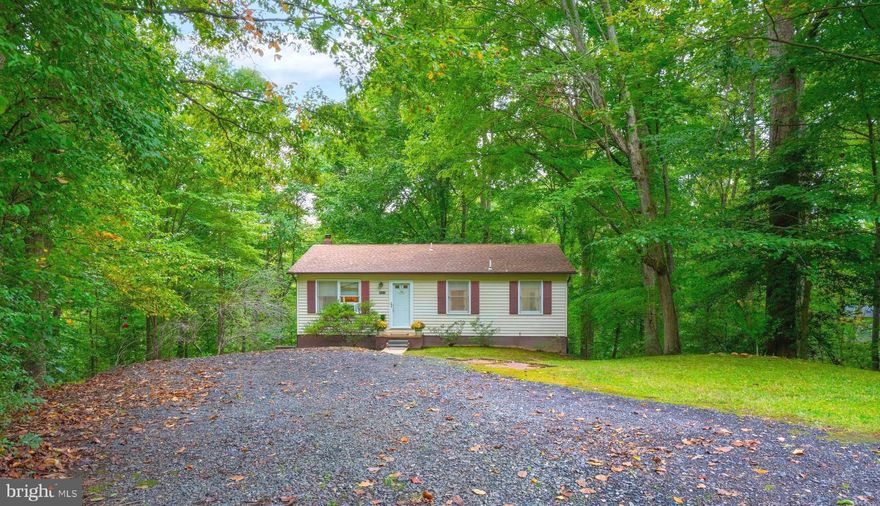 Welcome to the 26816 Pine Dr, a serene haven nestled on over 5 acres of lush sloping land, offering unparalleled privacy and an abundance of wildlife. This quaint and charming home is the perfect opportunity for those seeking a tranquil escape or a nature enthusiast's dream. As you approach the property, you'll be captivated by the natural beauty surrounding you. The spacious yard provides ample space for outdoor activities, gardening, or simply enjoying the sights and sounds of nature. With abundant wildlife, this location is perfect for hunting or observing the local fauna in their natural habitat. Inside, the home features a comfortable layout with three moderately sized bedrooms that offer plenty of natural light and peaceful views of the surrounding landscape. The living area is perfect for cozy gatherings, while the kitchen is ready for your personal touch, allowing you to create the heart of your home. An unfinished basement provides endless possibilities—transform it into a workshop, potential additional living space as its roughed in for an additional bath, or a personal retreat that suits your needs. With a sense of seclusion yet convenient access to local amenities, this property is a rare find. The 5.29 acres is comprised of 4 parcels including two parcels that total 4.1 acres that the home is perched on and the other two lots of approximately 0.6 acres each are undeveloped with added potential.  Also to add to the location's privacy you will find that the rear of the property backs up and adjoins to 268 acres of protected land owned by St Mary's County! So whether you’re looking for a weekend getaway or a full-time residence, this home offers the ideal balance of comfort and natural beauty you may be looking for.  Enjoy being just minutes from the Patuxent River,  local seafood restaurants and bar with live entertainment, and Snow Hill Park and Beach for your hiking and beach desires.  Don’t miss your chance to own this unique piece of paradise being offered for sale for the first time!  Be ready to schedule your private showing to see this beautiful property!