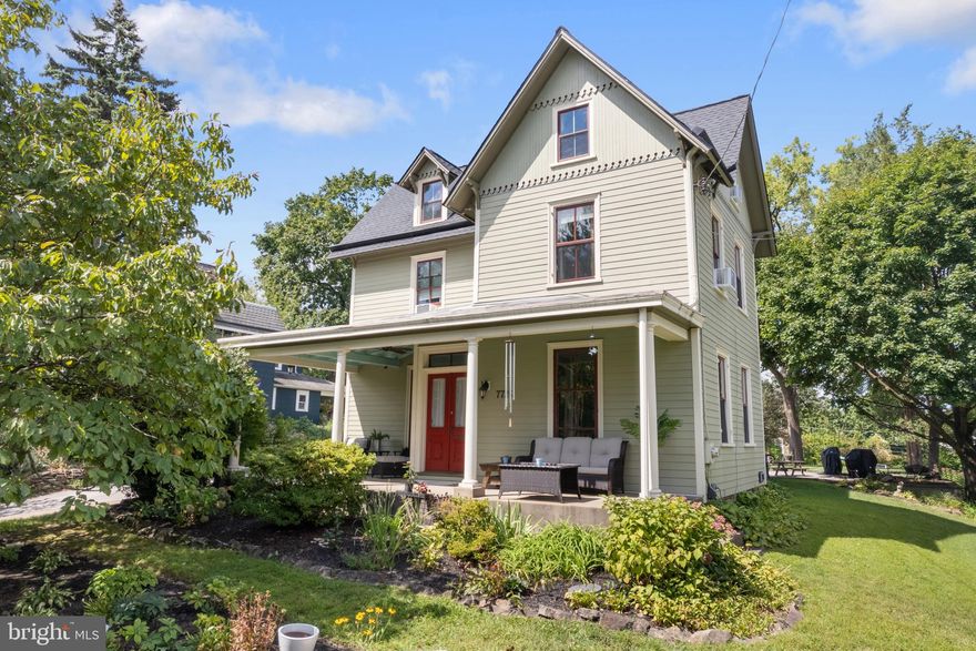 Welcome to this character-filled 5-bedroom, 2.5-bath home offering nearly 3,000 square feet of updated living space on a beautiful 1/3-acre lot in Elkins Park. Thoughtfully updated while retaining its original charm, this spacious home is just 1/2 mile from the Elkins Park train station and a short walk to the local elementary school.  Inside, you'll find wood floors throughout the first and second levels. The main floor includes a bright living room and a cozy family room, perfect for both entertaining and everyday living. At the center of the home is a large dining room with built-in bookshelves, a convenient powder room, and an expansive mudroom with walls of windows and a stainless steel laundry tub.  The updated kitchen at the rear features an eat-in area, 6-burner natural gas stove, double ovens, coffee bar, and generous counter space for meal prep and hosting. Upstairs, the second floor offers three generously sized bedrooms and a newer hall bath with a large walk-in shower. The third floor has two more bedrooms and a full bath featuring a classic clawfoot tub. The property includes a newer rear patio, perfect for outdoor dining or relaxing, and a spacious yard with mature trees. The detached, two-car garage includes electric, plumbing & gas lines ready for future hookups, and space for a workshop or studio. The large driveway can easily accommodate up to six vehicles. Recent updates include a newer electrical panel, Hardie Plank siding, new roof, water filtration system, mostly newer windows, and newer rear patio and newer front porch columns. This home offers a rare combination of size, character, updates, and walkability in a sought-after location. Schedule your showing today.
