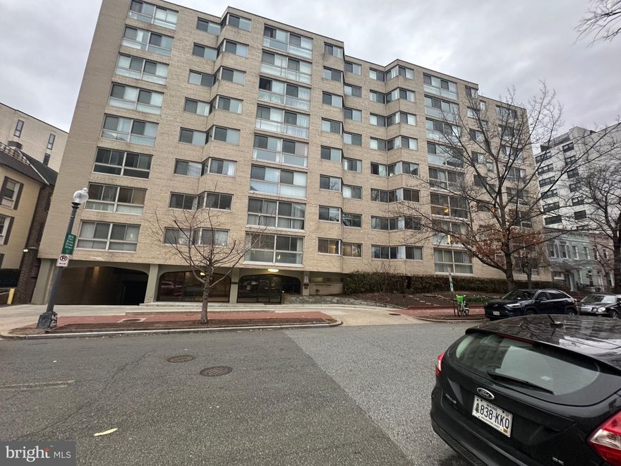 Nestled within the prestigious Foggy Bottom community, this exquisite mid-rise apartment offers a unique blend of luxury and comfort, perfect for those seeking an elevated lifestyle. Spanning 413 square feet, this thoughtfully designed unit is a canvas for your personal touch, featuring extensive hardscape that enhances the exterior charm and provides a welcoming ambiance. Step outside to discover beautifully crafted patios, ideal for enjoying morning coffee or evening gatherings under the stars. The community boasts a stunning in-ground pool, surrounded by a secure fence, creating a serene oasis for relaxation and leisure. Whether you're taking a refreshing dip or lounging poolside, this space is designed for enjoyment and tranquility. Inside, the kitchen is equipped with high-end appliances, including a built-in range, a single oven, and a gas range, all designed to inspire culinary creativity. The refrigerator offers ample space for your gourmet ingredients, making meal preparation a delight. The layout is perfect for entertaining, allowing for seamless flow between the kitchen and living areas. Safety and convenience are paramount, with a dedicated lobby desk, main entrance lock, and a comprehensive security system ensuring peace of mind. Smoke detectors are installed for added safety, allowing you to focus on enjoying your home. The community amenities extend beyond the apartment, with an association fee that covers essential services such as electricity, gas, heat, water, and trash removal, allowing you to live effortlessly. Snow removal and insurance are also included, ensuring that your living experience is as hassle-free as possible. With transportation options just moments away, including an airport less than 10 miles and bus stops within a mile, commuting is a breeze. This prime location offers the perfect balance of urban convenience and suburban tranquility, making it an ideal retreat. This property is not just a home; it's a lifestyle. Experience the luxury of community living in Foggy Bottom, where every detail has been considered to provide you with a comfortable and inviting atmosphere. Embrace the opportunity to make this exquisite apartment your own and enjoy the exclusive lifestyle it offers.