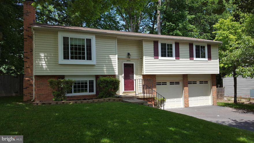 Beautiful 4 bedroom, 2.5 bath home. Great upgraded kitchen with new appliances in 2011, wood floors & table space. Separate dining room & living room, lower level has rec room/family room. Garage with finished flooring, workbench and storage. Huge fenced in back yard, screened in deck off of the dining room for those summer BBQ's. New garage door in 2011 all windows and driveway replaced in 2014