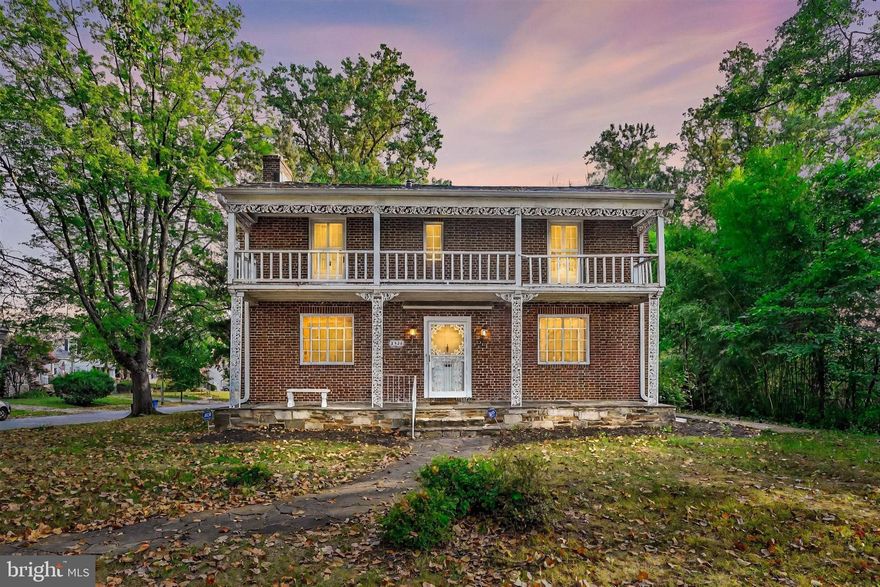 Classic charm, solid construction, and room to make it your own—this all-brick 1940 Colonial in Ashburton offers the kind of value Baltimore buyers rarely see at this price point.

With 2,176 finished sq ft above grade, this home features a rare 2-car attached brick garage, a massive 10,725 sq ft lot, and a layout that just works. The heart of the home is anchored by a dramatic 2-story brick fireplace, perfect for cozy nights and architectural character you can’t fake. Upstairs, you'll find three generously sized bedrooms and two full baths. Downstairs, a finished basement with a rear entrance adds flexible space for a gym, office, rec room, or guest setup.

Outside, the two-story front porch adds charm and curb appeal—and offers the perfect perch for morning coffee or evening conversation. The yard is wide, private, and bursting with potential.

This home has been cared for and lived in—not flipped. While it may be ready for your updates, it's fully functional and offers a rare opportunity for owner-occupants to move in, customize over time, and build equity in one of Baltimore’s most established neighborhoods.

Quality bones, standout features, and serious space—right here in Ashburton.