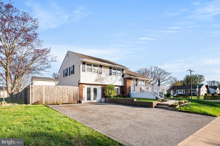Welcome to this beautifully updated 3-bedroom, 2-bath split-level home situated on a spacious corner lot in the vibrant community of Brookhaven. From the moment you approach the inviting front deck, you’ll feel right at home. Step inside to an open-concept living, kitchen, and dining space, all tied together with new luxury vinyl plank flooring (2023) that adds a fresh, modern touch.

At the heart of the home is a stunning 9-foot granite island, perfect for gathering and entertaining. The kitchen also features beige painted cabinetry, brand-new stainless steel appliances (2024), and an abundance of natural light—creating a space that’s both functional and welcoming.

Upstairs, you’ll find three well-proportioned bedrooms, each with new ceiling fans, and an updated hall bath. The walk-up attic provides ample storage space, easily accessible yet tucked away.

The lower level expands your living space with a beautifully updated full bath featuring a rainfall tile shower, a spacious mudroom with a stackable washer/dryer, butcher block storage cabinet, and direct access to the covered rear patio—perfect for all-season use.

Step outside to a fenced-in backyard designed for entertaining, complete with solar lights, a large shed, and plenty of room for outdoor fun and summer BBQs. Parking is a breeze with a driveway that accommodates up to four cars, plus an additional parking space behind the fence. Pride of ownership is evident with a new roof  and french drain in the crawl space (2024) adding additional peace of mind for its next family.

Enjoy the sense of community Brookhaven offers, with local parks, seasonal parades, and neighborhood events just steps from your door. Conveniently located near the Promenade at Granite Run, the charming town of Media, and major routes including I-95, 322, 1, and 352—this is the one you've been waiting for!