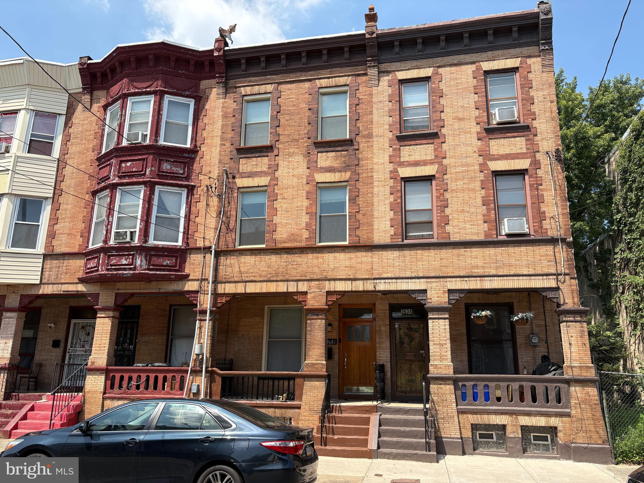 Stunning Fully Renovated 4-Bedroom Row Home in North Philadelphia. Discover modern comfort and style at 2632 N 17th St, Philadelphia PA, a beautifully renovated 1,998 sq ft row home in North Philadelphia. This spacious 4-bedroom, 2-full-bath residence, fully updated in 2014, blends contemporary upgrades with classic charm, perfect for families or professionals seeking urban convenience. Step into a welcoming tiled foyer with a striking mosaic accent, leading to a bright and airy first floor featuring 10-foot ceilings. The generous living room and dining room, both adorned with plush wall-to-wall carpeting, offer ample space for relaxation and entertaining, complete with a convenient coat closet. The renovated kitchen (2014) boasts modern appliances, including a new dishwasher and refrigerator, and opens to a private rear patio—ideal for morning coffee or evening gatherings. Upstairs, the second floor houses three well-appointed bedrooms and a sleek full bathroom, while the third floor features a private fourth bedroom with its own full bathroom and a spacious walk-in closet—perfect for a primary suite or guest retreat. The entire home was meticulously renovated in 2014, with new sheetrock, carpeting, 220-amp electric, plumbing, hot water heater 75 gallon electric, HVAC systems, wired for cable/internet and security system. The first and second floors enjoy dedicated HVAC, while the third floor is equipped with a brand-new mini-split system for year-round comfort. During the renovation, the second and third floors received all-new floor joists, flooring, and sheetrock, ensuring durability and quality. Outside, a welcoming covered front porch invites you to relax, while the home's prime location offers exceptional convenience—with SEPTA Route 2 running along 17th Street and the Broad Street Line subway just a short walk away. This move-in-ready gem combines modern upgrades with urban accessibility. Don’t miss your chance to own this North Philadelphia treasure—schedule a tour today!
