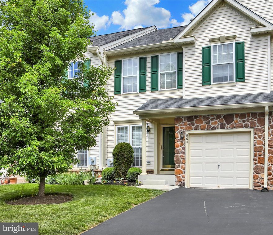 Welcome to 864 Geranium Drive, located in the highly desired 55+ community of Bluestone Creek, situated in a premium location that backs to a scenic stretch of woods, creating a serene and private backyard area. This move-in-ready Ryan Built “Collier” model features a first-floor owner’s suite and bathroom, 2 additional upper-level bedrooms and a spacious loft, 2.2 total baths, a finished basement w/egress window, and nearly 2,400 square feet of living space. A covered porch leads to the entry foyer and the dramatic 2-story sunlit great room which features new carpeting (5/26), upper and lower sets of windows and an upper balcony which overlooks the entire area, The formal dining room includes new carpeting (5/26), recessed lighting and a crystal chandelier. The upgraded kitchen includes random plank gunstock hardwood flooring, granite counter-tops with a 4” to 8” granite backsplash and an under-mount stainless steel double sink. Also included are upgraded cabinets with a built-in pantry and Lazy Susan and GE appliances which include an electric stove, dishwasher, microwave and a French Door refrigerator. The adjoining breakfast room features, a continuation of the hardwood flooring and a slider exiting to an expansive rear wooden deck with serene open and private wooded views. The first-floor luxury owner’s suite boasts newly installed carpeting (5/26), a ceiling fan and a very large walk-in closet and spacious double closet. The private owner’s bathroom includes a dual vanity, a double ide walk-in shower with bench seat, 8” ceramic tile flooring and recessed lighting. A half bathroom and a hallway exit door to the garage complete the main level of this most elegant home. The staircase to the upper-level leads from the main level to the upper loft area (21’ x 8’ ), which includes carpeting and can be used for a recreational room, play area, or numerous other uses. Bedroom #2 includes carpeting and a spacious walk-in closet. Bedroom 3 includes carpeting, casement windows and a spacious double closet. A full bathroom with a tub/shower with ceramic tile wall surround, a double vanity, a linen closet and ceramic tile flooring complete the upper level. The finished basement features a 21’ x 15’ recreational/bar area with upgraded random plank LTV luxury vinyl flooring. A spacious finished 3’ x 26’ media room/recreational area also features upgraded random-plank LVT luxury vinyl flooring, chair rail, and recessed lighting. A 14’ x 11’ finished private office/craft room area also includes upgraded random plank LTV luxury vinyl flooring, chair rail, and recessed lighting. A half bathroom is conveniently located to service the finished basement area. Finally, the unfinished basement area features the laundry area, mechanical systems and room for plenty of storage. Conveniently located near the The Shops at Valley Square, Graeme Park, and both Five Ponds and Fairways Golf Courses this home has so much to offer! The location is also within close proximity of the PA Turnpike and I-476, which makes a commute to Philadelphia or the Lehigh Valley a much easier commute.