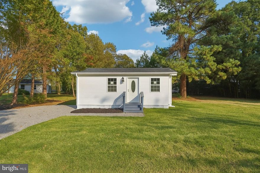 Unbeatable value by the beach, practically a brand-new home just a stone’s throw from the Potomac River.

This gorgeous 3-bedroom, 2-bath coastal retreat has been completely rebuilt from the foundation up, with brand-new everything and even water views. Located in a golf-cart-friendly neighborhood, it’s the perfect mix of small-town charm and modern comfort. Step inside to a bright, open-concept layout with wide-plank LVP flooring throughout. The kitchen features quartz countertops, stainless steel appliances, and soft-close cabinetry, making it both stylish and functional. Both bathrooms have a clean, spa-like feel with designer tile, glass shower doors, and updated fixtures. Out back, a spacious deck is perfect for entertaining - whether it’s a crab feast with friends, morning coffee, or unwinding in the evening with a breeze coming off the river. With the water just steps away, it truly feels like a getaway.

Major updates include a new roof, siding, windows, HVAC, plumbing, electrical, and public sewer connection - so you can move in with peace of mind.

Located in the Westmoreland Shores community, with access to a voluntary HOA offering a sandy beach, marina, boat ramp, and waterfront event space. Just a short golf cart ride to Colonial Beach for restaurants, live music, and the boardwalk. Convenient to Dahlgren, Fredericksburg, DC, and Richmond. Whether you’re looking for a full-time home, weekend escape, or investment property, this one checks all the boxes.