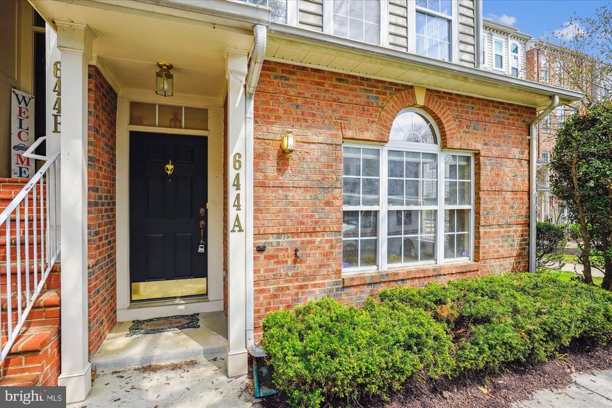 What a lifestyle! Lakelands is the community you will fall in love with!  This neo-traditional community integrates schools, restaurants, entertainment, shops, parks and sidewalks throughout to help neighbors meet neighbors.  End unit townhouse/condo, is filled with sunlight.  Offering 2 bedrooms, 2.5 Baths, LR w/ gas fireplace, dining area, kitchen with stainless appliances, gas stove, French door refrigerator, granite counters, upgraded backsplash, large windows,  and balcony, 1 car garage, off street parking.  Just steps to all the amenities of Kentlands/Lakelands!