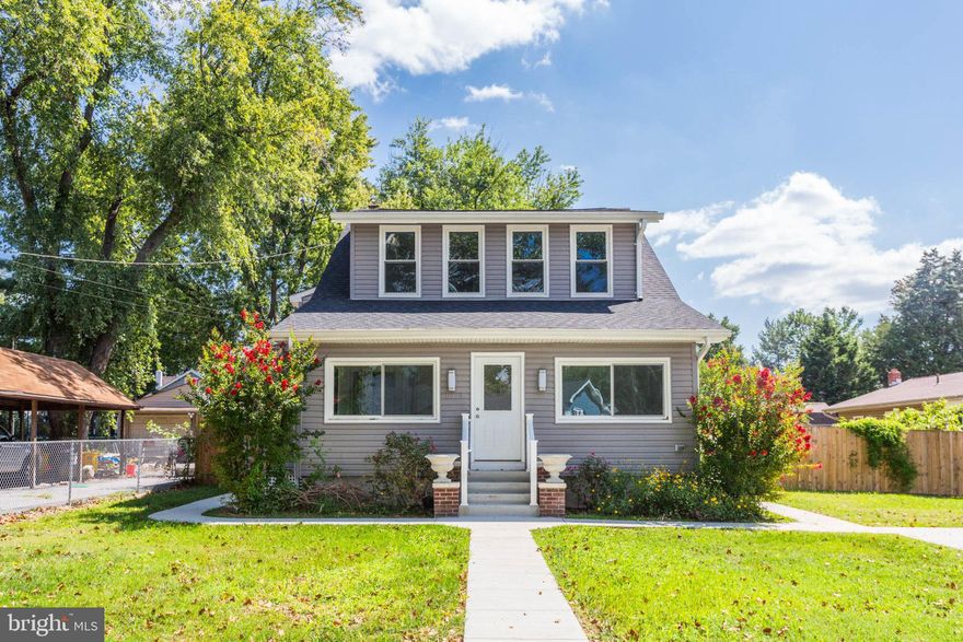 SELLER SAYS MAKE AN OFFER!!!! Come home to this stunning, meticulously renovated Colonial home full of character and charm that has been fully updated from top to bottom, offering water views  from the backyard within a Water Privileged Community.  This home boasts 6 bedrooms, 2 full baths, 2 half baths, 9ft ceilings on each level, gleaming hardwood floors and a bright, open spacious floorplan. Upon arrival you will notice an expansive enclosed solarium with oversized windows and attached half bath. Crossover to the lovely foyer that introduces you to the Main-Level. On this level is a Living Room with a gas/propane fireplace with stone surround. The above ground propane tank is owned. Next you will find the large Gourmet Kitchen with marble countertops & coordinating backsplash, 5 burner gas/propane cooking, stainless steel appliances, soft close cabinetry and Breakfast Room. Additionally, there is a huge room attached to the rear deck that can be used as a main level bedroom/office/den with attached full bath and laundry room. The deck is a perfect spot for relaxing or entertaining. The Upper-Level sleeping quarters are all generously sized to include a Primary Bedroom, hallway 7x5 walk-in closet, full bath and 4 more bedrooms. Venture outside to the beautifully maintained lawn with mature trees and landscape. The backyard is fully fenced-in with 2 custom secure sheds, one is oversized and can be used as a workshop or outdoor office. This peaceful Community does NOT have a mandatory homeowner's association to deal with. Located in a water privileged community with beaches, boat ramp, Park(s) and short walk to the bay. Conveniently located close to dining, shopping and commuter routes. Do not miss the spectacular opportunity to own this newly renovated home with all of its superb features and water amenities...Schedule your showing, TODAY!