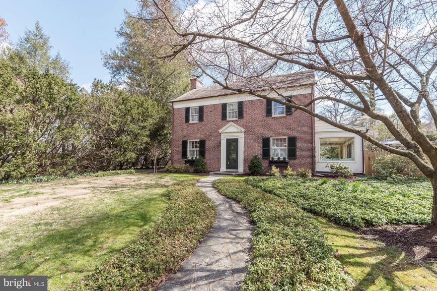 Wonderful, bright & open all brick Colonial. Updated kitchen opens to the FR & to small mud room area & HB. SunRm = addtl area with Pella doors to a cheery flag stone patio. A well appointed LR w/hardwoods & wd burning FP. The 3 roomy upper BRs. Master suite w/a FB & WIC. Two addtl BRs access hall FB. Full attic & bsmt too! Sunny fenced & landscaped yard. Walk to Roland Park shops & restaurants!