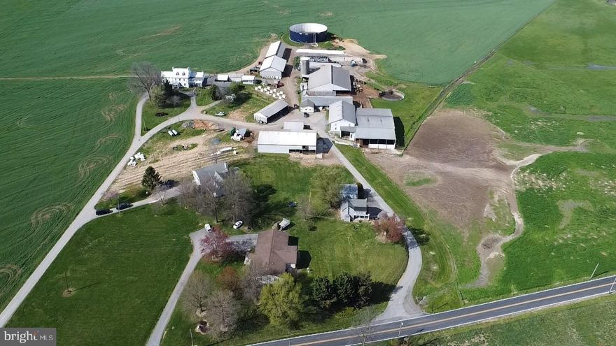 "Auburn Farms" is a large working dairy farm with high quality soils.  173+ acres with level to gently sloping land.   86% Class 1 and Class 2 soils (53% Class 1, 33% Class 2). Year-round running water on the Property (Israel Creek).

Two free stall barns with 218 stalls; bank barn with 5,600 SF of hay storage; 2 large silage bunkers; 5,400 SF Morton building with concrete floor and electric service; several machine sheds with concrete floors and electric service; 2 milking parlors; 3,700 SF heifer barn & manure storage with concrete floor and electric service; 25+ acres of pasture fenced with high tensile wire; chicken coop, stone smoke house, 2 wells serve the property including multiple hydrants.  See detailed list of agricultural improvements posted in documents.

Total of 4 residences on the Property (see details posted in documents).   Main house is over 5,500 SF of GLA above grade; original stone section constructed in early 1800's.  Large brick addition added in late 1800's features 12'+ ceilings on first and second floors.  

Preserved by MALPF Easement, one subdivision right believed to still exist.

Sold "as is".   24 hours advanced notice required to tour the property.  Do not enter without appointment.