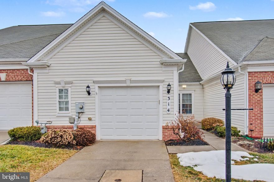 Welcome home to your very own happy place!  This beautiful & well-maintained unit is now available in amenity-rich Carroll Vista and waiting for you to just move in and start enjoying your new lifestyle. You'll love the soaring ceilings and open floor plan with decorative picture-frame & crown moldings. A nicely appointed kitchen with extensive cabinetry and a huge island is ready for the chef. You’ll enjoy the large dining area and adjoining great room with plenty of space to entertain family and friends or just relax. This home also offers a flex room which can be used as an office/library or hobby room.  If you’re looking for an active adult community in a semi-rural setting, you will love it here. Enjoy the beautiful clubhouse, indoor and outdoor pools, fitness center, tennis, virtual golf, a chip & putt, bocce, pickleball, billiards, disc golf, walking paths, gardens, and the list goes on. A wonderful place to make new friends and revel in your new retirement lifestyle!