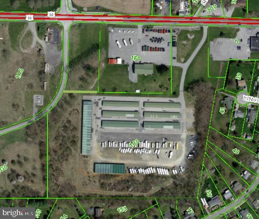 Successful and profitable owner operated self-storage business for sale! 257 units on 14.39 acres with the ability to expand. There are 6 existing buildings that are rented, pads are already installed for 2 more buildings, and approvals are in hand for a total of 10 new buildings. Storm water management is already in place for all approved units. 2 additional structures are currently in place for covered storage of 33 rvs. There is also parking for 110 trucks, trailers, rvs, or cars. Occupancy rate 94% with an 8% cap rate. This year gross income is on track to increase to $371,400.00 Call for details.