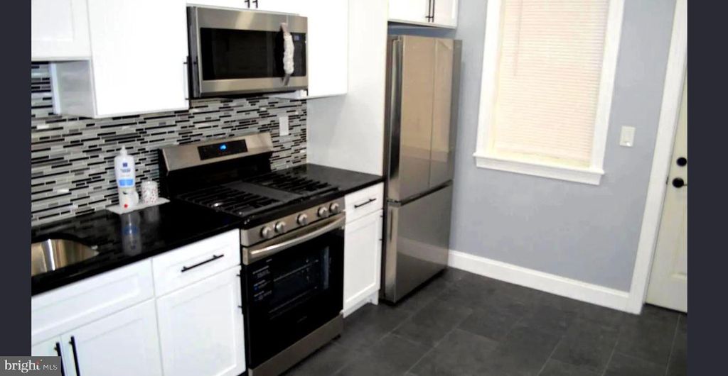 Photo of 2335 N Beechwood Street, PHILADELPHIA, PA 19132 (MLS # PAPH2580742)