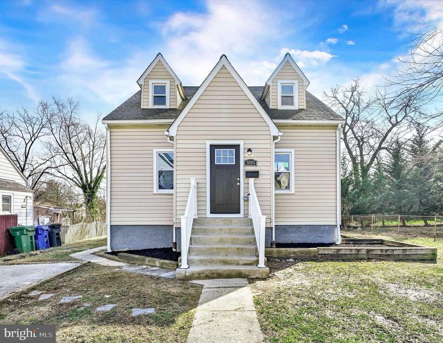 Welcome home to this beautifully renovated property featuring 5 bedrooms and 3 full baths, including an en suite bath off the main level bedroom. Additional features include a new HVAC, new HWH, gorgeous white 42" cabinets, new stainless steel appliances, quartz countertops, new bathrooms, recessed lighting, gorgeous hardwood floors, an electric fireplace, large yard, and a driveway. The finished basement is an entertainer's dream. Now, all you have to do is move in!