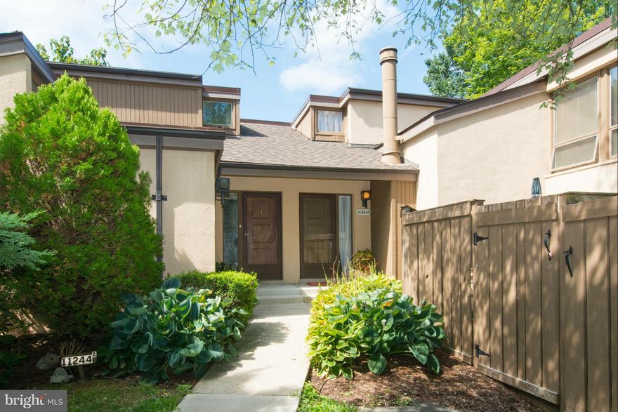 Great little place to call home.  Freshly painted, new carpet, vaulted ceilings, fireplace, beautiful renovated gourmet kitchen with stainless appliances, patio with privacy fence, assigned parking in covered car port.  Move in ready.