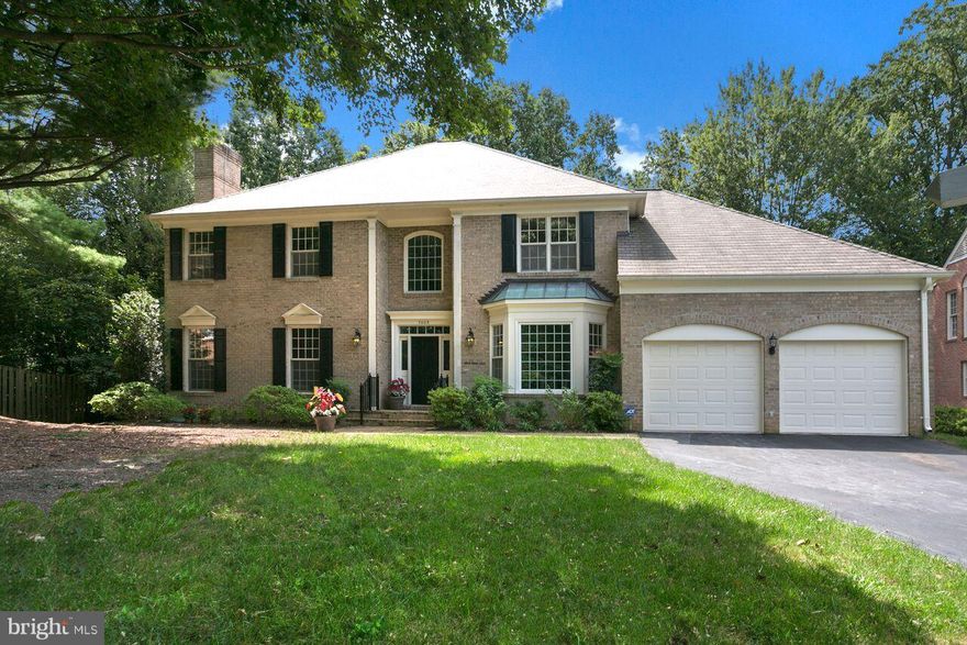 Beautiful stately brick colonial on private cul-de-sac in McLean.  Soaring, light filled 2 story family room with stone fireplace, large windows & French doors to private deck looking out to the trees.  Six bedrooms, 4.5 baths, including Main Level Master Suite.  Excellent location, close to McLean, Tysons, Metro, I-495, Dulles Toll Road.  Langley Schools.