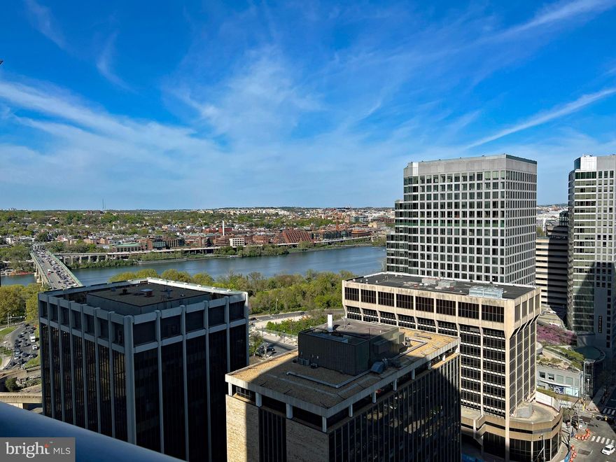 Stunning 19th floor luxury condo with breathtaking Potomac River views overlooking Georgetown and the Kennedy Center. This 2,655 square foot home features 3BR (2BR + large den w/en suite bath)/3.5BA, floor to ceiling windows & multiple sliding doors out to a huge balcony with spectacular views of Georgetown & DC landmarks. Special features include private elevator entry, large entertaining balconies, designer lighting & remote controlled blinds. The current owners installed wide plank walnut flooring throughout the home, a stone accent wall in the great room, significant additional recessed lighting w/bedside controls in primary bedroom & replaced the compact stacking washer & dryer with full size, stacked washer & dryer. The best enhancement is that the current owners extended the Snaidero cabinets through the dining room. This additional storage makes condo life even more convenient. Speaking of convenience, this residence has 2 adjacent parking spots which are in front of the home's TWO LARGE 8' X 10' STORAGE UNITS. Those storage units are a significant benefit not found in many condos. Additional luxury features include 24hr concierge, onsite mgmt, valet parking for owners & their guests, a full service health club, indoor pool, theater room, social room, & catering kitchen.

Turnberry Tower's location is hard to beat. It is .2 miles from the Rosslyn Metro Station, .4 miles from the Key Bridge, and just a bit further into Georgetown w/a wonderful assortment of dining and shopping venues. Downtown DC is readily accessible and Ronald Reagan Airport, 3.6 miles away, is just a quick Metro ride.