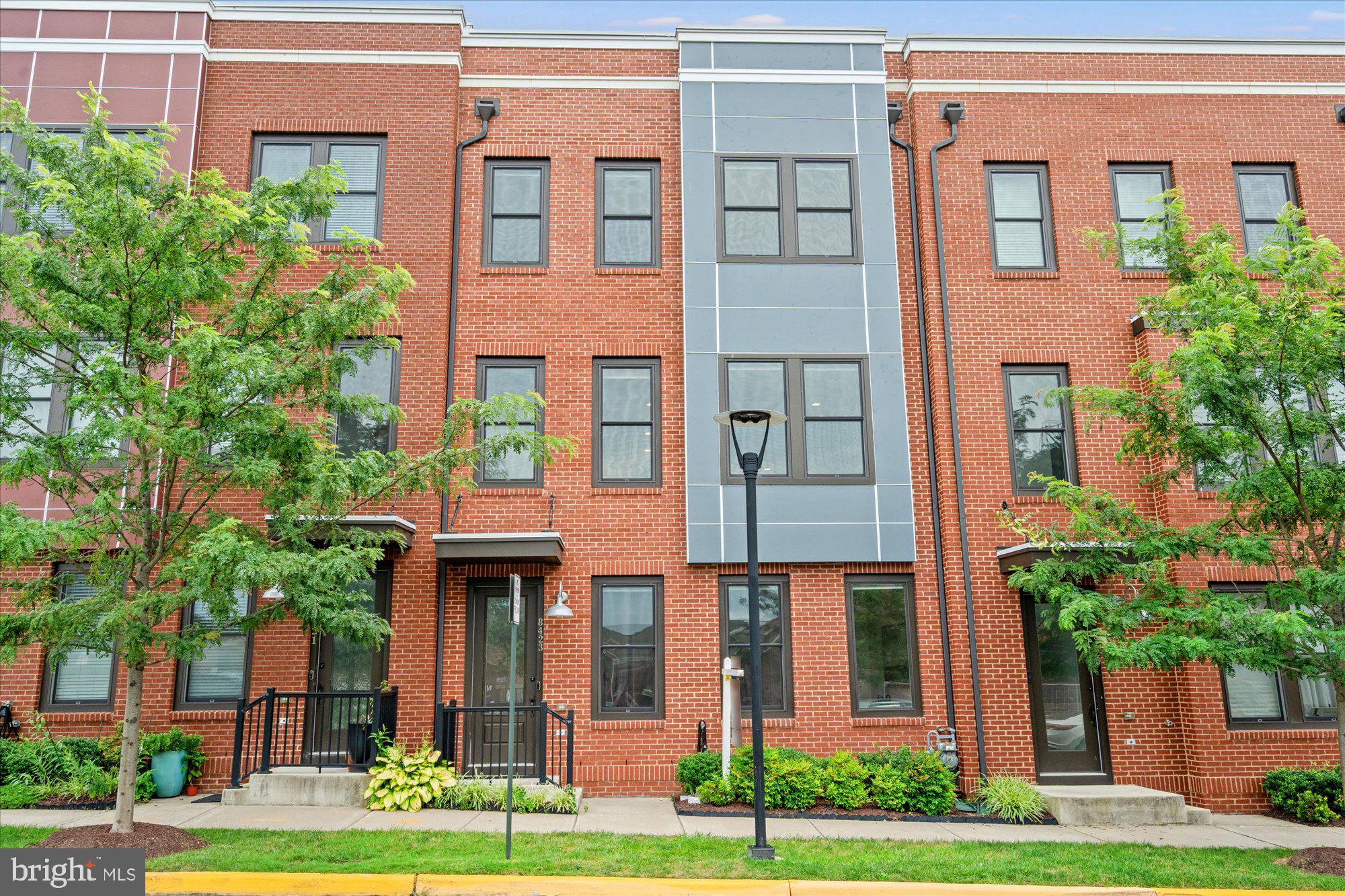 LIKE NEW luxury 2-car garage townhome in Laurel Hill with rooftop deck has been meticulously maintained --just move in! New upgrades include carpeting on upper level and new flooring on lower level. Upgraded gourmet kitchen with white shaker cabinets, quartz counters, double oven, gas cooktop and kitchen island seating for 4. Enjoy open concept living with plenty of natural light from beautiful picture windows and hardwood floors throughout the main level. The upper level boasts a spacious owner's suite with a sitting area, walk-in closet and luxurious en-suite bathroom featuring double vanities and a walk-in shower. Two additional bedrooms, a full bathroom also with a double vanity and a laundry area complete the upper level. You'll be amazed by the picturesque panoramic views of the neighborhood and beyond from the expansive rooftop patio, where you can relax and unwind by the gas fireplace while sipping on your favorite beverage. This luxurious space is perfect for hosting barbecues, dinner parties or simply enjoying a quiet book with a breathtaking view. Enjoy the fantastic community amenities including a pool, playground, club house and fitness center all included in HOA fees. Located just minutes from major commuter routes, shopping, and dining. Walk to the Lidl food market and several other walkable retail shops plus the Amazon Fresh is a short 5 minute drive away. Enjoy plenty of local recreational opportunities including the neighboring Laurel Hills Golf Club, Cross County Trail, Laurel Hill Mountain Bike Trails, Workhouse Art Center, and Historic Occoquan! Close to Washington DC and major transportation surrounding the area. Less then 10 miles from VRE/Springfield Metro and less then 20 miles from Reagan and 25 miles from Dulles. Don't miss out on this incredible opportunity to own a luxurious townhome in a sought-after location.