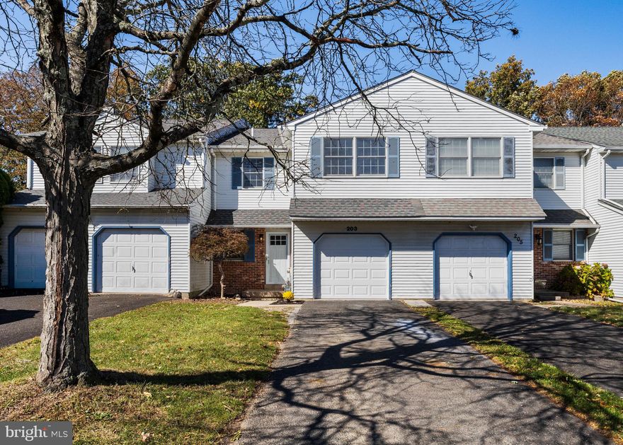 Welcome home to 23 Jonathan Drive, a beautifully updated 3-bedroom, 2.5-bath townhome in the desirable community of The Orchard, located within the North Penn School District. This move-in ready home combines modern updates with comfortable living spaces, all in a prime North Wales location close to shopping, dining, and major routes.

Step inside to find a bright and airy entryway with fresh neutral paint and new flooring that flows throughout the main level. Just off the entry, a convenient half bath before leading into the heart of the home — the stunning renovated kitchen, featuring white cabinetry, marble countertops, stainless steel appliances, and a breakfast bar perfect for casual dining. There’s also room for a small table, making this kitchen both stylish and functional.

The kitchen opens seamlessly into the dining room, a great spot for gatherings and entertaining, which then flows into the spacious living room. A sliding glass door extends your living space outdoors to a private balcony overlooking the serene, tree-lined backyard that features the Little Neshaminy Creek — the perfect place to unwind.

Upstairs, you’ll find three generous bedrooms, including a primary suite with two closets, a private en-suite bath, and the special bonus of its own balcony overlooking the backyard. A fully renovated hall bath and a laundry area complete the second floor.

The finished basement offers endless versatility — ideal for a home office, gym, playroom, or additional living space — and includes walk-out access to the backyard. Additional highlights include a one-car garage and convenient access to Routes 309 and 202, making commuting a breeze.

Don’t miss your opportunity to make this beautifully updated home yours — schedule your private showing today!