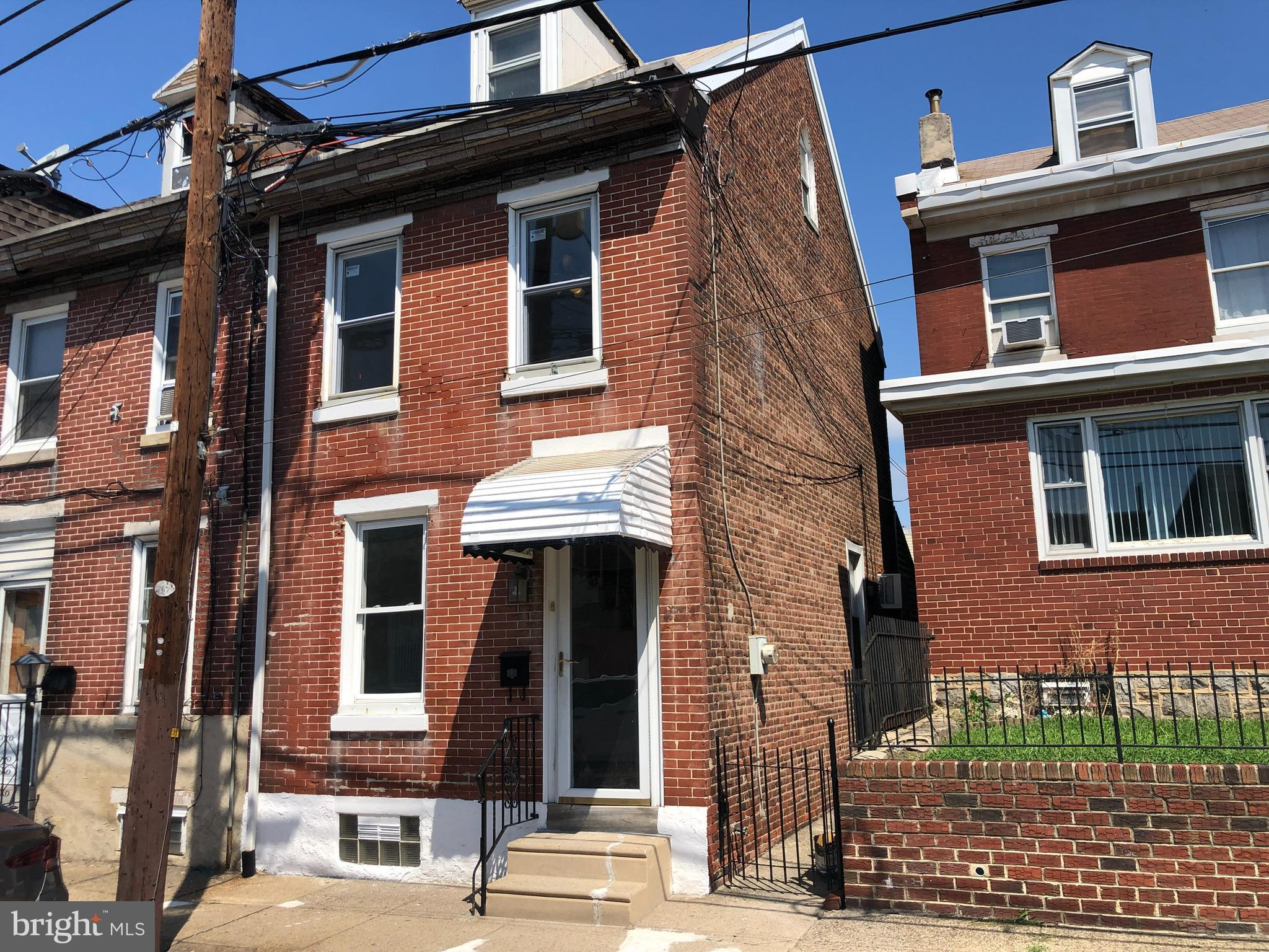 Nicely updated 3-bedroom, 2 full bathroom straight-thru situated on a quiet block in Bridesburg. Enter to find newly installed hardwood, laminate floors and fresh paint throughout. The main level features a spacious living room with ceiling fan, dining area with ceiling fan & closet and leads to an updated kitchen with new stainless-steel appliances, new cabinets with granite counter, a full bathroom and access to the private rear yard with covered patio that is great for warm weather entertaining. The 2nd- level hosts 2 bedrooms with ceiling fans & adequate closet space. The 3rd floor hosts a 3rd bedroom and new full bathroom with stall shower. The lower level is a full basement that is great for storage and ha washer & dryer hookups. Great property in a great neighborhood. **No pets allowed** Tenants pay electric, gas & water. Screening through National Tenant Network. Available July 1st. Landlord is a licensed PA & NJ Real Estate Broker.