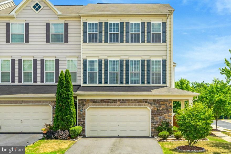 OFFER DEADLINE SATURDAY 5:00 PM.  WELCOME TO STONE RIDGE! Beautiful end unit stone front Astoria model with 4 bedrooms and 4 bathrooms. MAIN LEVEL: open floor plan, hardwood floors; Kitchen has an island with seating, granite counters, backsplash, stainless appliances and pantry; Family room has a gas fireplace and atrium door to expanded deck; Living and Dining Rooms. ENTRY LEVEL has a Rec Room, full bath, Bedroom, walks out to fenced backyard. UPPER LEVEL: Primary Bedroom has a tray ceiling, 2 walk-in closets, oversized bathroom; 2 additional bedrooms plus hall bath.

Enjoy all that Stone Ridge has to offer:
3 ponds, amphitheater with an event lawn, 2 tennis court, clubhouse, fitness center, pool, basketball court, tot lots, walking trails. Close to restaurants and shopping.