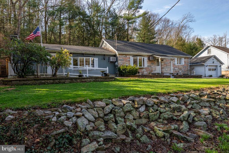 Sitting on over an acre of private land in the Pine Grove School District, this home is all about comfort and peace of mind—starting with a brand-new roof installed in 2023.  You will love the heart of this home, which is dining  and living room/family room area, where cathedral ceilings and exposed beams give the space a really open, lodge-like feel.  It’s the kind of room where you want to kick back at the end of the day, especially with the easy-to-clean laminate flooring. There is a woodstove in the stone fireplace. Another highlight is the huge sunroom; with its tile floors and skylights, it’s basically a bright, year-round retreat.  Even the primary bedroom brings the outside in with a massive sliding glass door that leads right out to the patio.  Super cute and private back yard area with deck, shed and retaining wall. The layout is super functional, featuring first-floor laundry and a breezeway that keeps you dry as you head to the oversized one-car garage. The 2nd floor is perfect for a third bedroom, a quiet home office, or just a massive amount of storage to supplement the unfinished basement. The well tank is new, as is the flooring and toilet in the powder room, and the flooring in the 2nd bedroom.
Outside, you have 1.22 acres to call your own, yet you’re only a short drive from the hiking trails at Sweet Arrow Lake and have easy access to I-81 for a smooth commute.  The taxes are VERY affordable! It’s a solid, well-cared-for home in a neighborhood where life just moves a little slower.