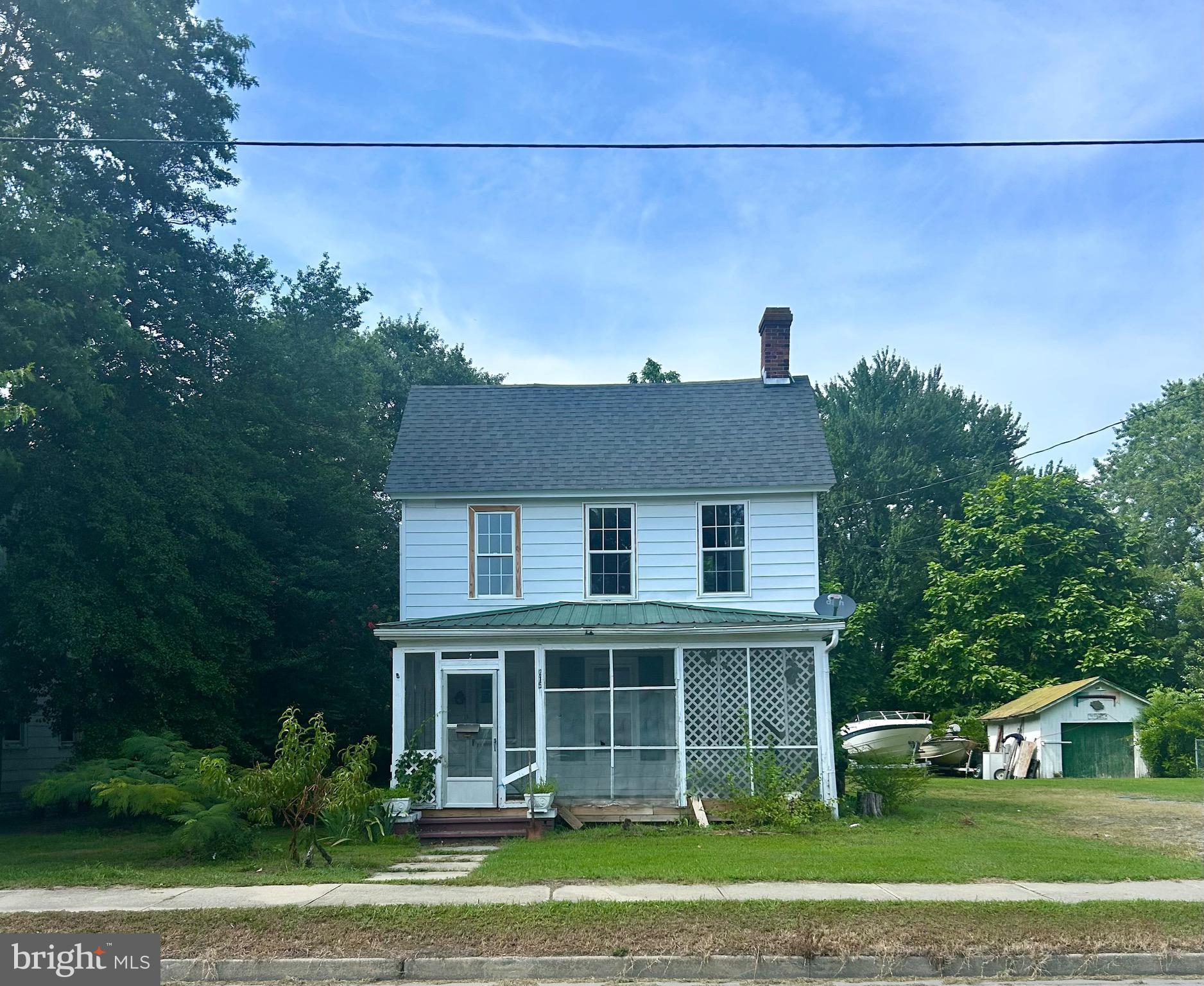 This property offers an exceptional chance for a BRRRR investment, fix and flip opportunities or a DIY restoration project. Recent improvements, including partial window replacements and a newer roof, set the stage for a transformative renovation. The property features two bedrooms on the second floor, a bonus room, two bathrooms, a flex room, an enclosed front porch, large driveway and a fairly secluded backyard. The property is being sold as is.