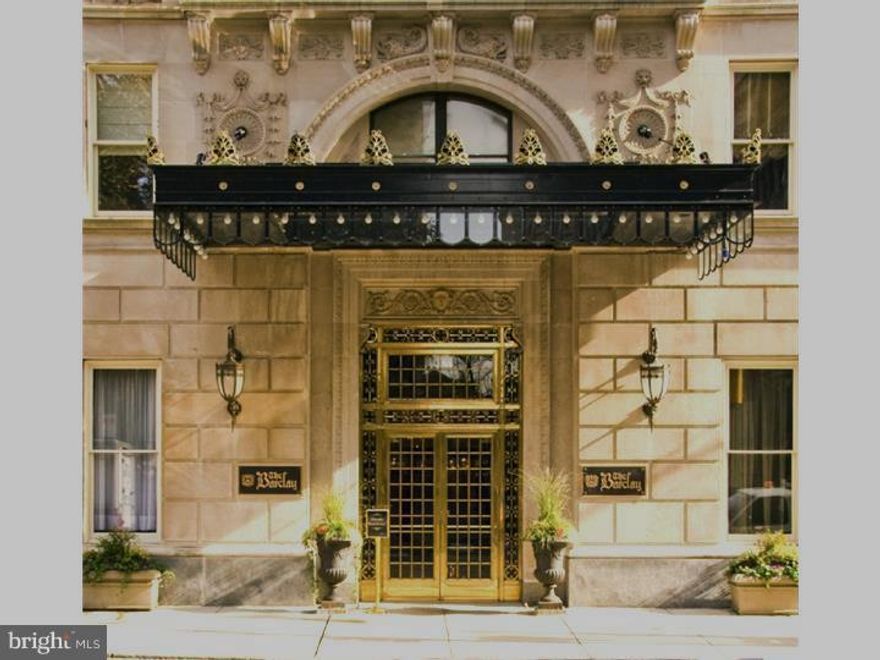 Elegant apartment at The Barclay with tree top views. Enter into a gallery with wood veneer walls and double coat closet. Large living room with built-in banquette seating and end tables, deco mantle piece and gorgeous views. Separate dining room/sitting room and large, open eat-in kitchen with stainless appliances, gas cooktop, granite counter tops and back splash. There are herringbone wood floors in the kitchen. Separate dry bar for entertaining. Small office/bedroom off kitchen, and full bath with black and white marble floor. Master bedroom with en suite all white bathroom. Bedroom has built-in bed frame and night tables. It overlooks the park. Second bedroom, also with full bath, also overlooks park and has double closets and built in bookcases. Washer/dryer in separate storage room.