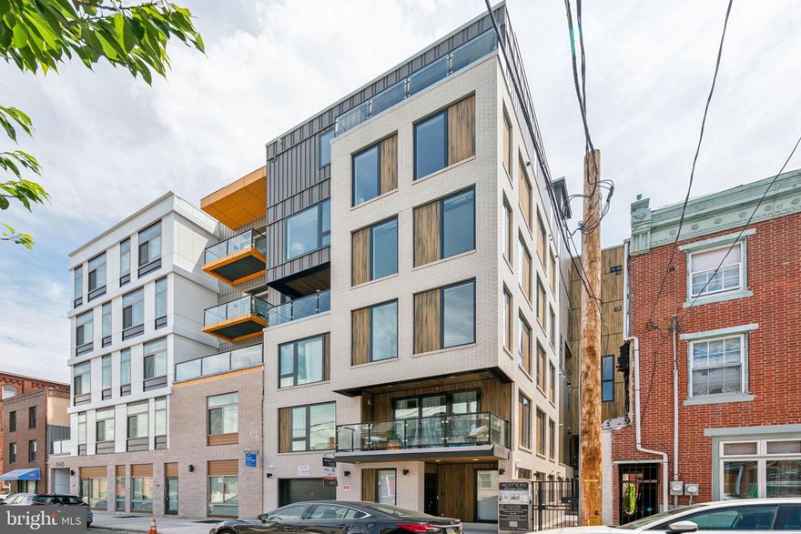 Buy this condo and receive a 4.5% interest rate!! Seller to pay for rate buy down! Light-drenched PENTHOUSE unit with private roof deck, and tax abatement are now available! Introducing the Refinery - an extraordinary luxury condo development, tucked away on an incredible block of Northern Liberties. Every residence in this 10-home building is uniquely designed and crafted to suit today's highest standards. This includes a building elevator, large outdoor spaces, and incredible finishes. Inspired by Zatos development, designed by award-winning GNOME, and built by Zatos Construction- the Refinery boasts 10 sophisticated residential units, each thoughtfully crafted to provide a luxurious living experience with industrial chic finishes throughout. A collection of different floor plans including flats, penthouse residences, and Mezzanine style units with massive 20’ tall ceilings. Most include private outdoor spaces, high-end appliance packages, exposed brick, steel, and more. Unit 10 Penthouse is a spacious 2 bedroom, 2.5 bathroom bi-level residence with amazing views and natural light. The first floor offers a large open floor plan with a chef's kitchen, dining, and living room. The industrial chic vibe includes open steel elements, exposed duct work, matte black cabinetry, and brick accents. The Refinery is strategically situated amidst the vibrant city life. Enjoy the convenience of being mere steps away from the bustling 2nd Street as well as Fishtown and be amongst Philadelphia's finest dining and entertainment establishments. Taxes & square footage are the buyer's responsibility to verify.  Taxes are not $1. Interest rate on the 2-1 Buy down is currently 4.5% but subject to change. **Offer is subject to interest rate fluctuations: 2-1 buy down is 4.5% year one, 5.5% year two, 6.5% year 3 through 30. The PAR Standard Agreement of Sale for New Construction of sale must be used for new construction properties whether completed or not. Seller will pay for 6 months of parking at a lot of buyer's choice with an acceptable offer to be paid at settlement.