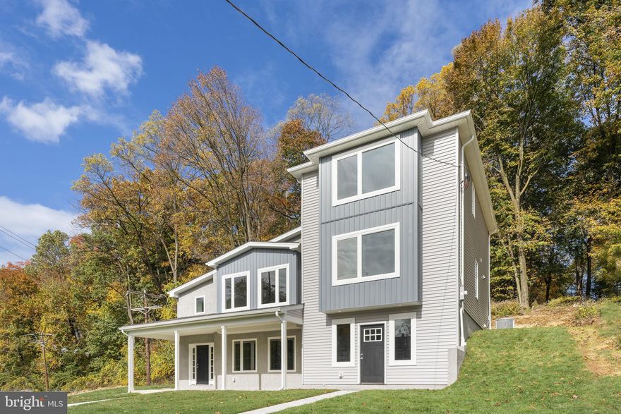 Nestled in the heart of Malvern Borough within the sought-after Great Valley School District, 153 Old Lincoln Highway is a beautifully renovated twin home. This home offers two bedrooms, one and a half bathrooms, and is available for rent immediately. Convenience is the hallmark of this location, as it is within walking distance of the Malvern Train Station, providing easy access to the R5 line, linking you to Philadelphia. Additionally, the vibrant local scene, with restaurants, shops, and season events, is just a stone's throw away. This home boasts a range of amenities, including two off-street designated parking spaces, a welcoming concrete walkway to the front door, and a flexible first-floor layout with spacious entry including entryway closet and a flex space that could serve as a home office, den, or playroom. This level is completed by the unfinished storage and mechanicals closet. On the second level, you'll find an open-concept great room and kitchen with modern white shaker cabinets, granite countertops, stainless steel appliances, and a breakfast bar. Sliding glass doors lead to a spacious, private deck, perfect for outdoor enjoyment. The second level also features a convenient half bathroom and a laundry closet with a stacked washer/dryer. Up again to the bedroom level, where two generously sized bedrooms await, served by a hall bathroom with a single vanity and a tub/shower combination. 153 Old Lincoln Highway offers the perfect opportunity to reside in a completely renovated twin home with all the modern amenities and the advantages of a prime location. With its proximity to the train station and the charm of Malvern Borough, as well as its highly-rated school district, this property is a rare find that you'll be proud to call home. No pets & no smoking. Available immediately!