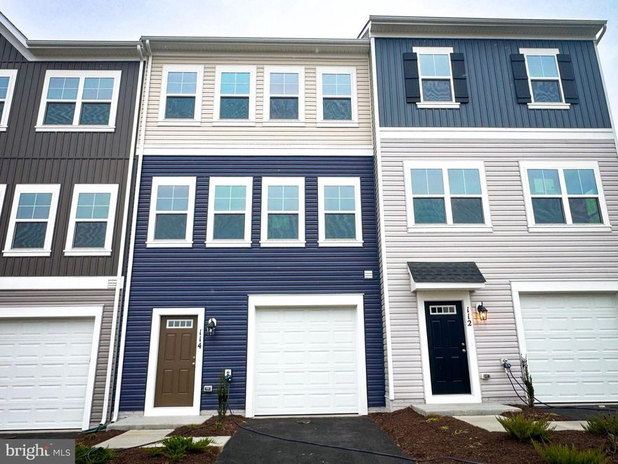 This new townhome backing to treeline is Ready for move in! 
The main level kitchen offers white cabinets, quartz counters, stainless steel appliances and is open to the breakfast nook, dining room, and living room that is well lit with abundant natural light from the many windows. Rear sundeck off of the family room for extra outdoor space.
Head up the staircase to the upper level to the primary suite with a large walk-in closet and ensuite. Additionally, there are two secondary bedrooms, a full bath, and a conveniently located laundry area. The finished lower level features a finished recreation room and a powder room, expanding your living space.
Located in Snowden Bridge, a premier master-planned community with exceptional amenities including a swimming pool, pirate water park, indoor sportsplex, community park, fenced in dog park, and playground. In addition, there is a bike track, walking trails, and a picnic pavilion. You won’t have to leave to have fun, but when you do, you’re just minutes from all the convenience and entertainment around Winchester. 
Closing assistance available. Ask about special financing!